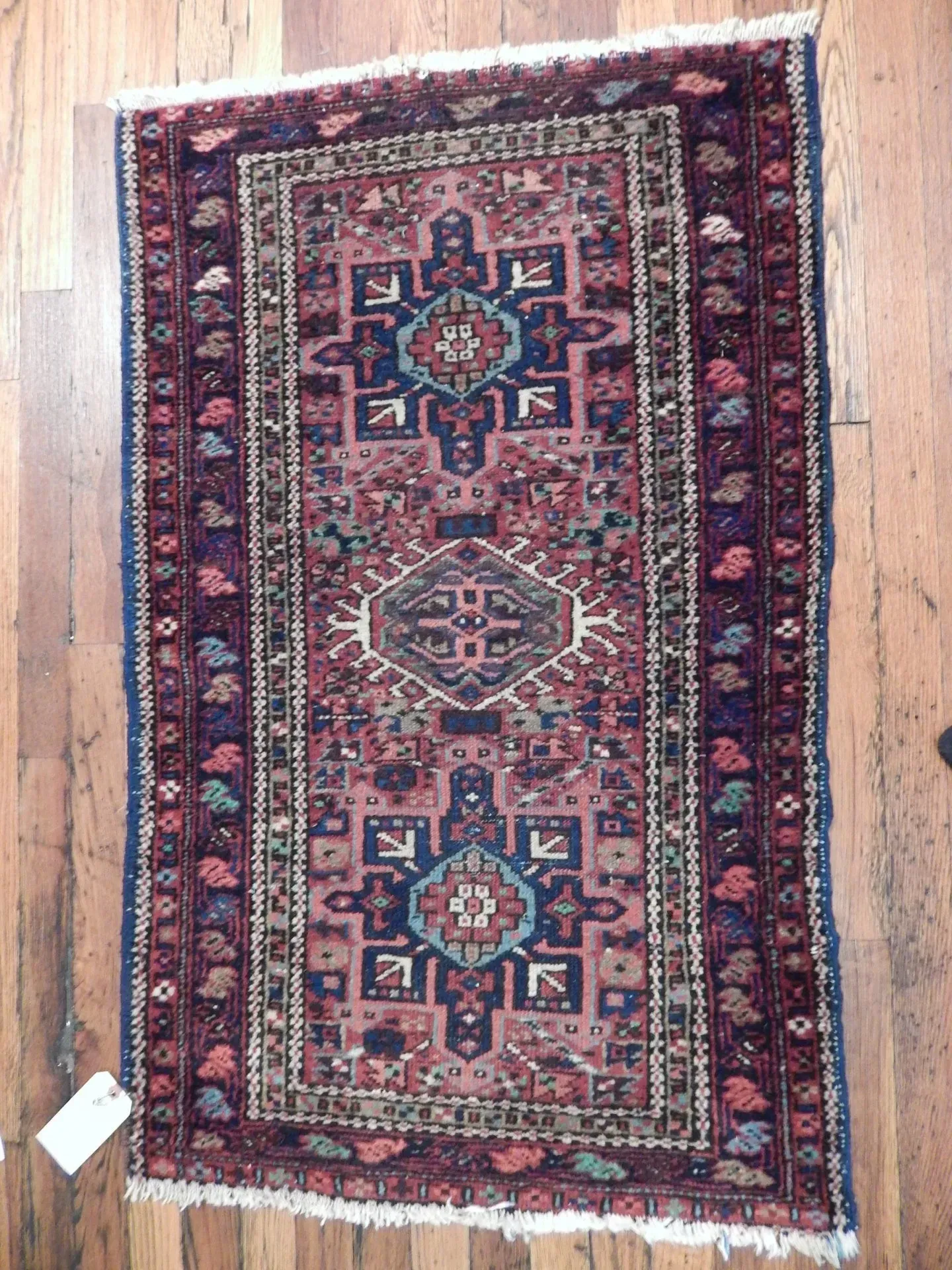 A rug with a detailed pattern on it.