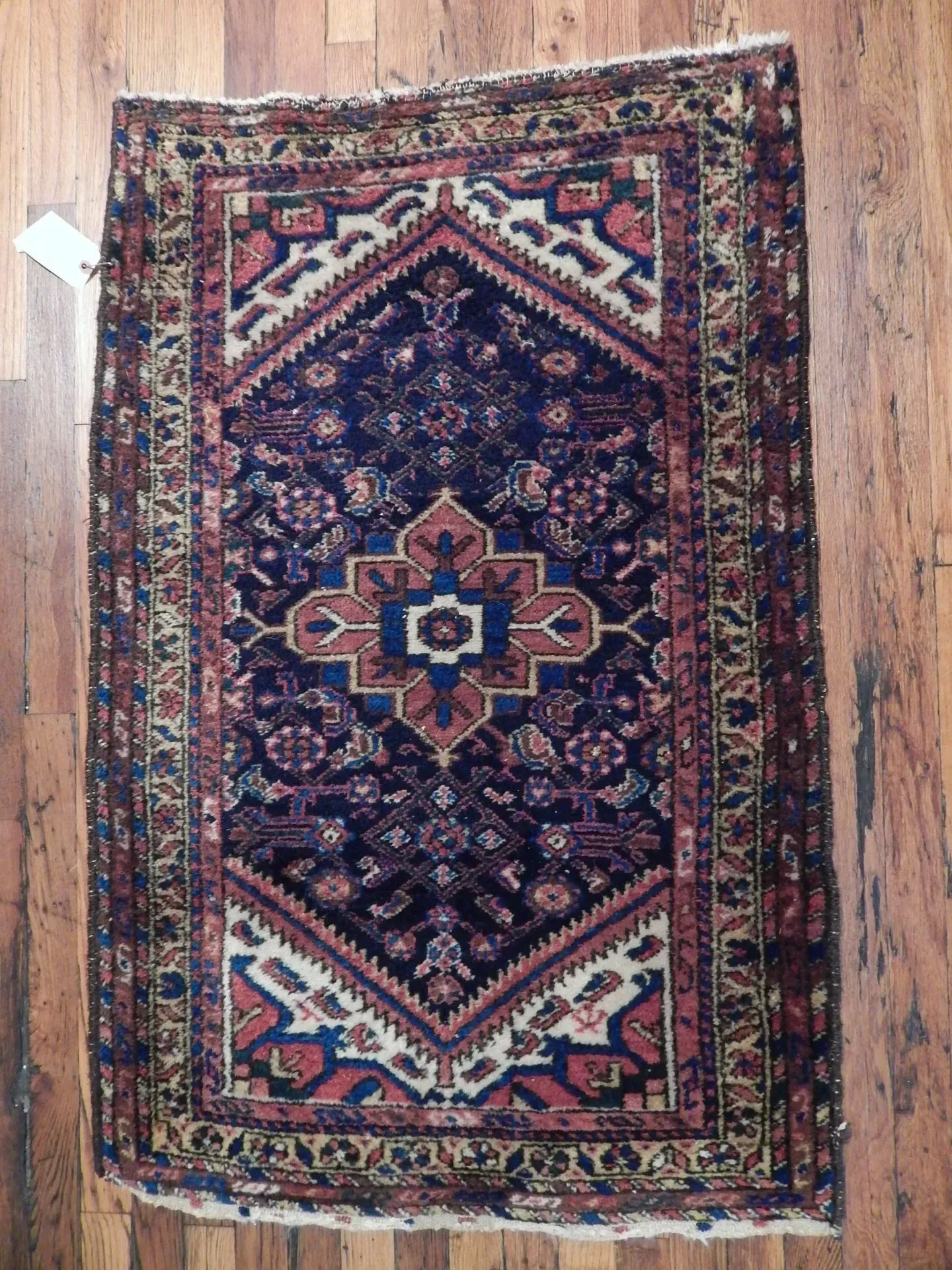 A rug with a detailed pattern on it.