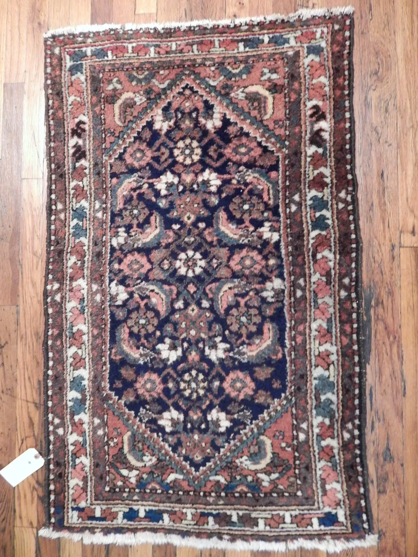 A rug with a detailed pattern on it.