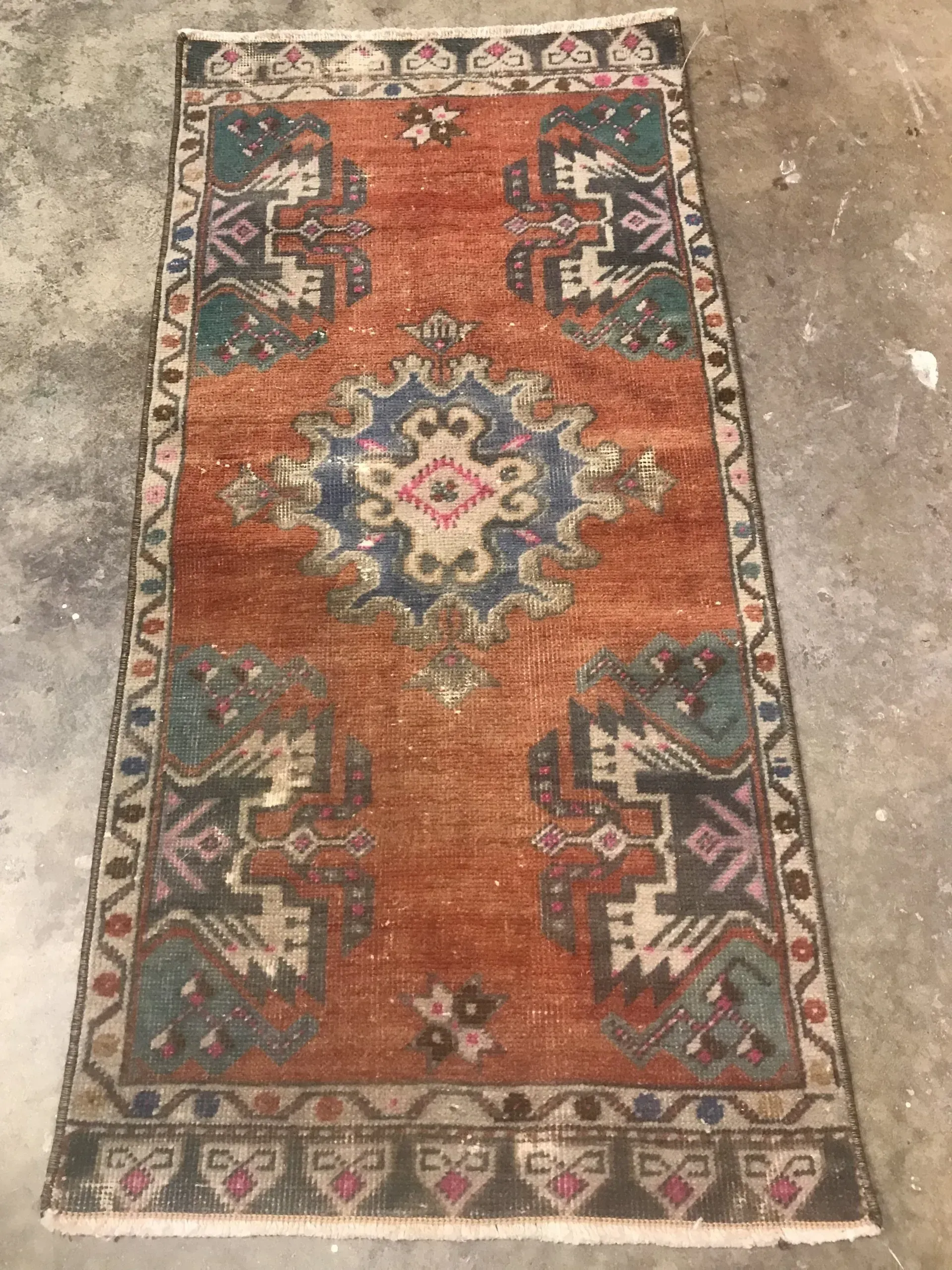 A rug with a detailed pattern on it.