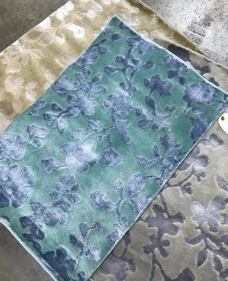 A rug with a detailed pattern on it.