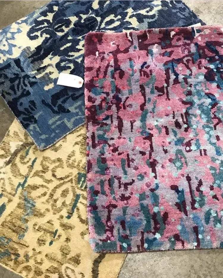 A rug with a detailed pattern on it.