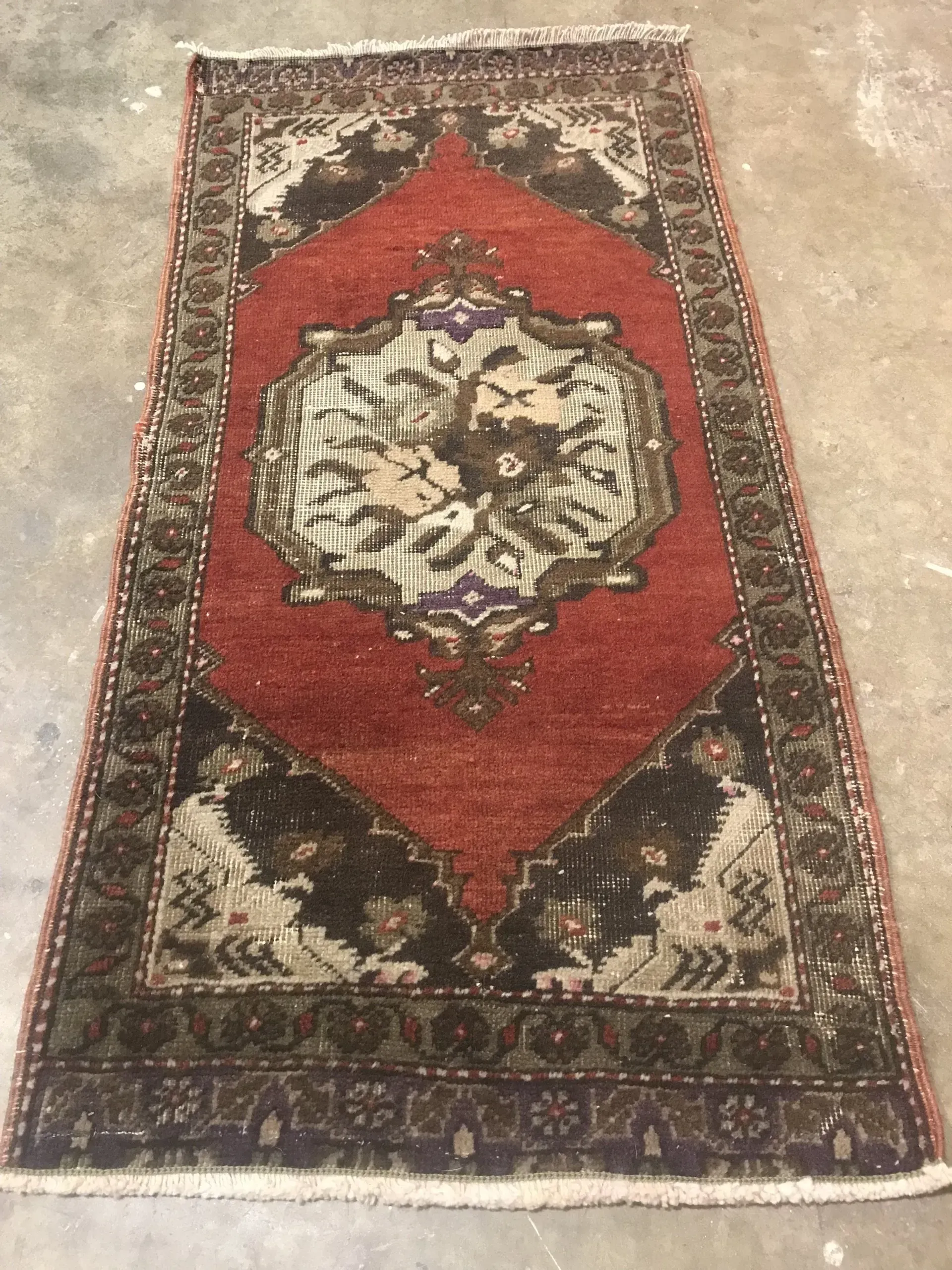 A rug with a detailed pattern on it.
