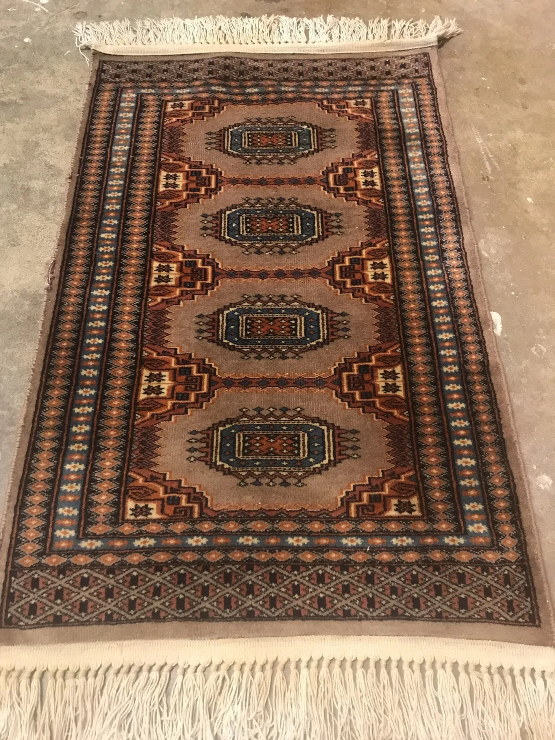 A rug with a detailed pattern on it.