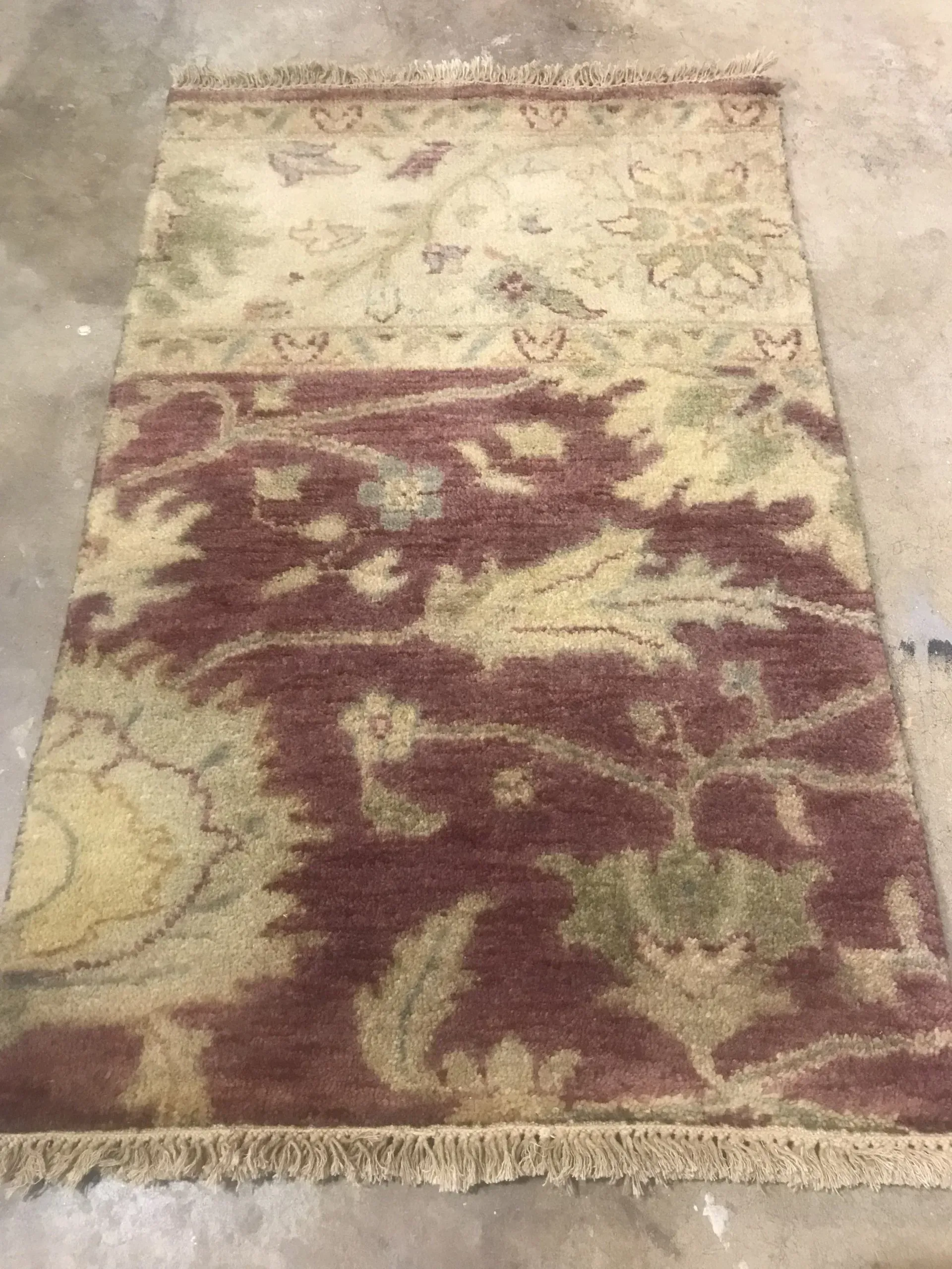 A rug with a detailed pattern on it.