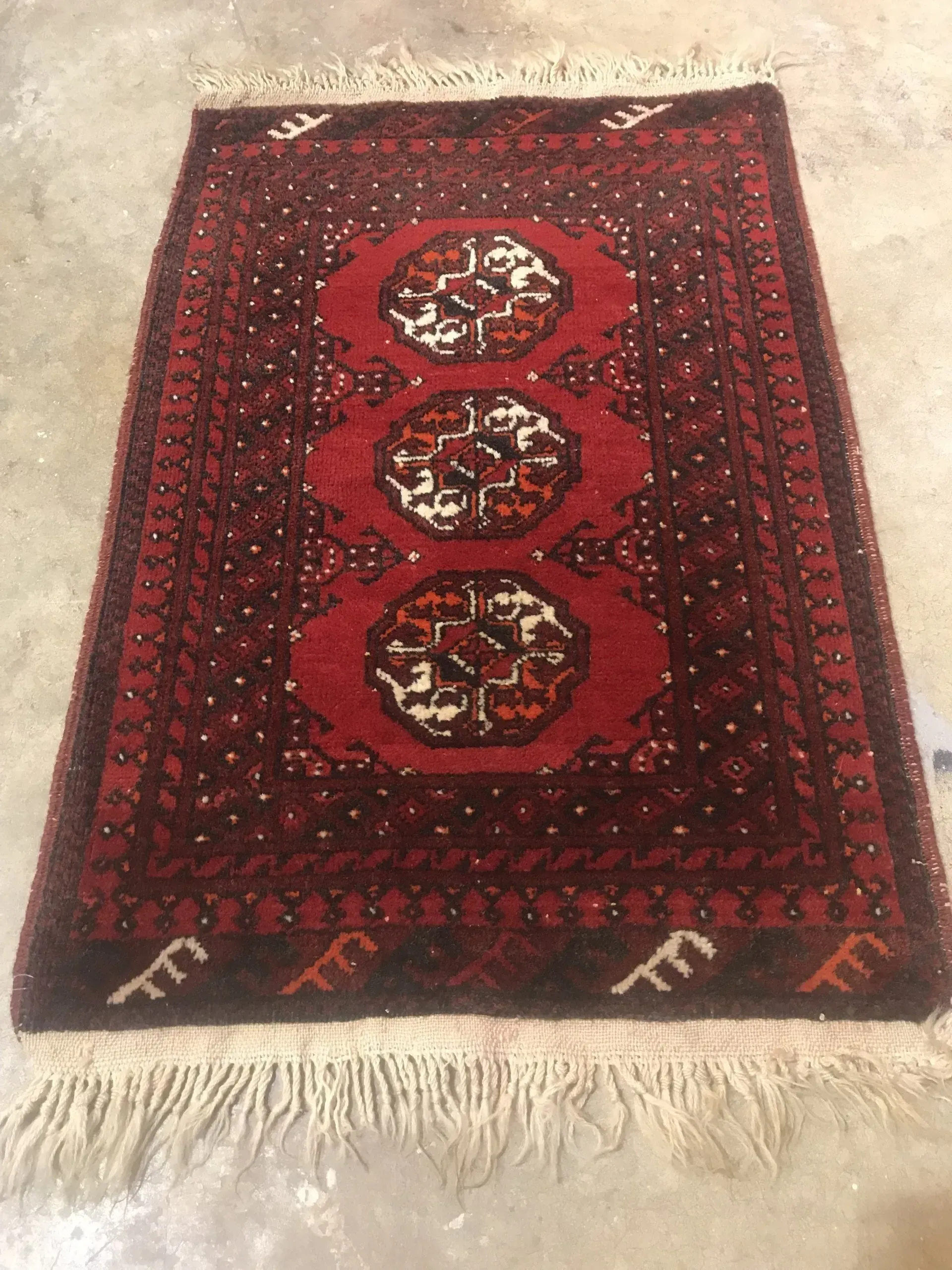 A rug with a detailed pattern on it.
