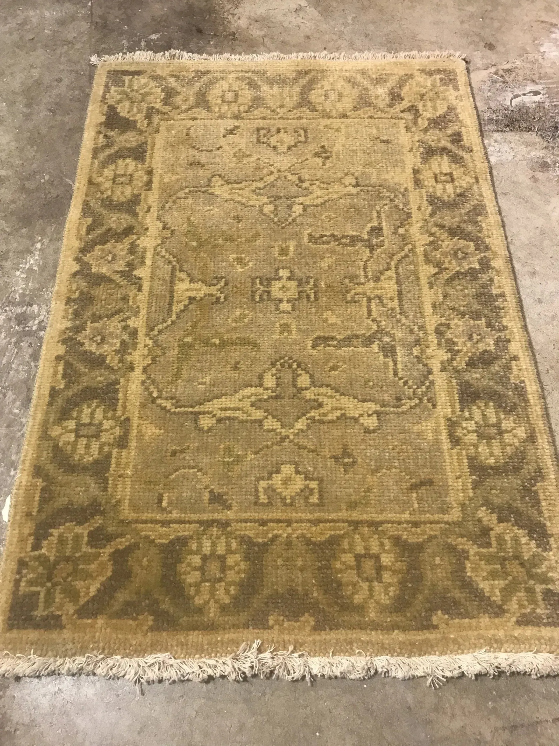 A rug with a detailed pattern on it.
