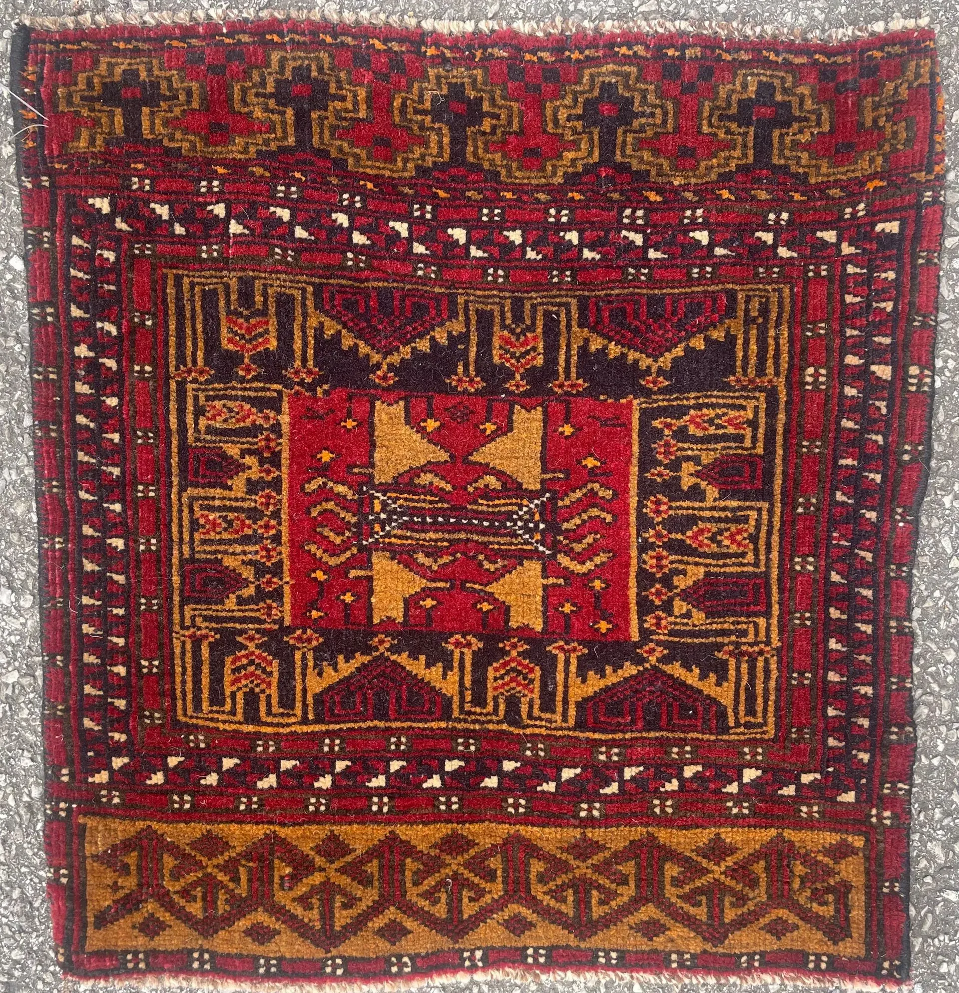 A rug with a detailed pattern on it.