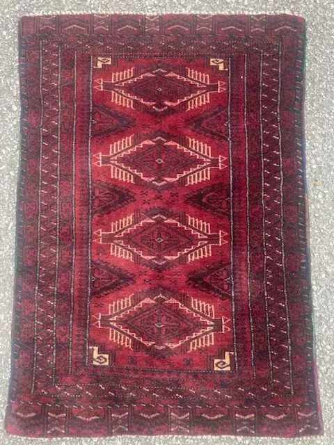 A rug with a detailed pattern on it.