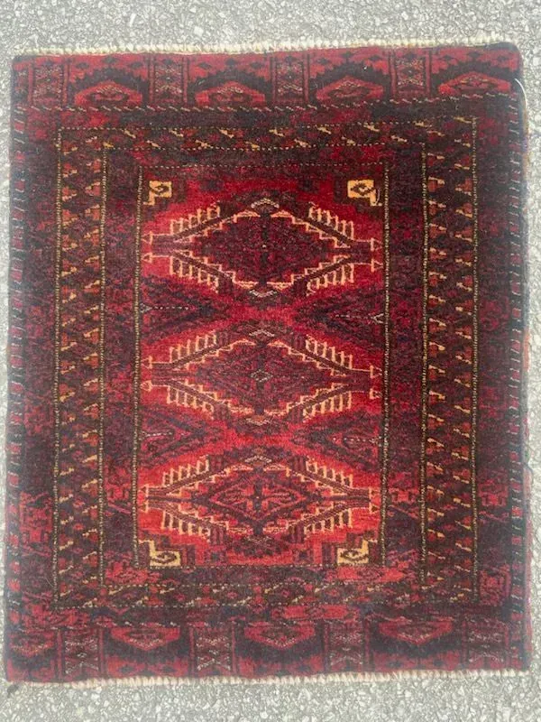 A rug with a detailed pattern on it.