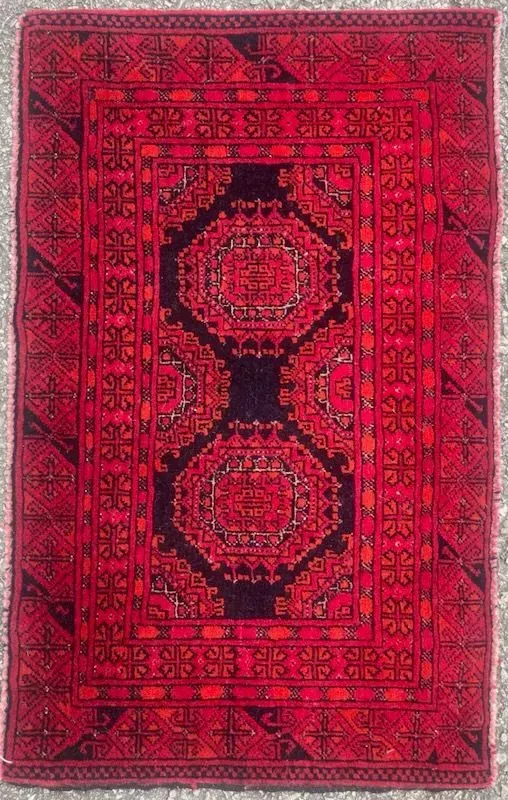 A rug with a detailed pattern on it.