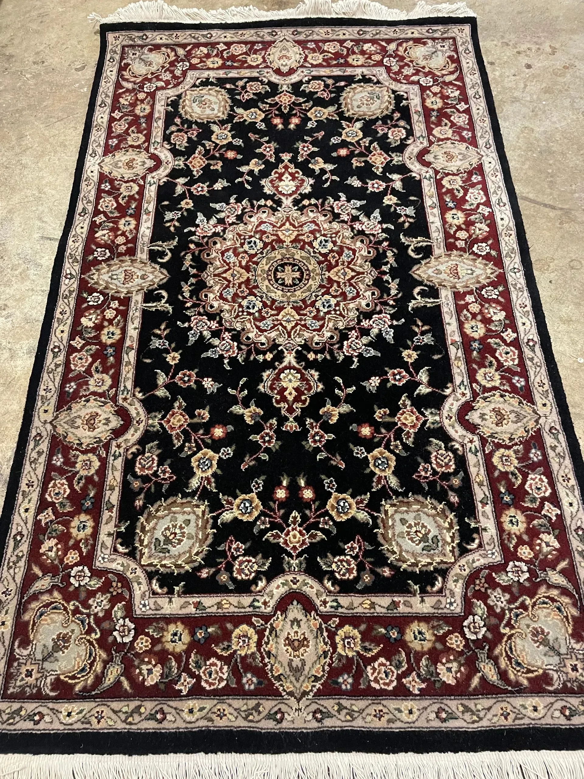A rug with a detailed pattern on it.