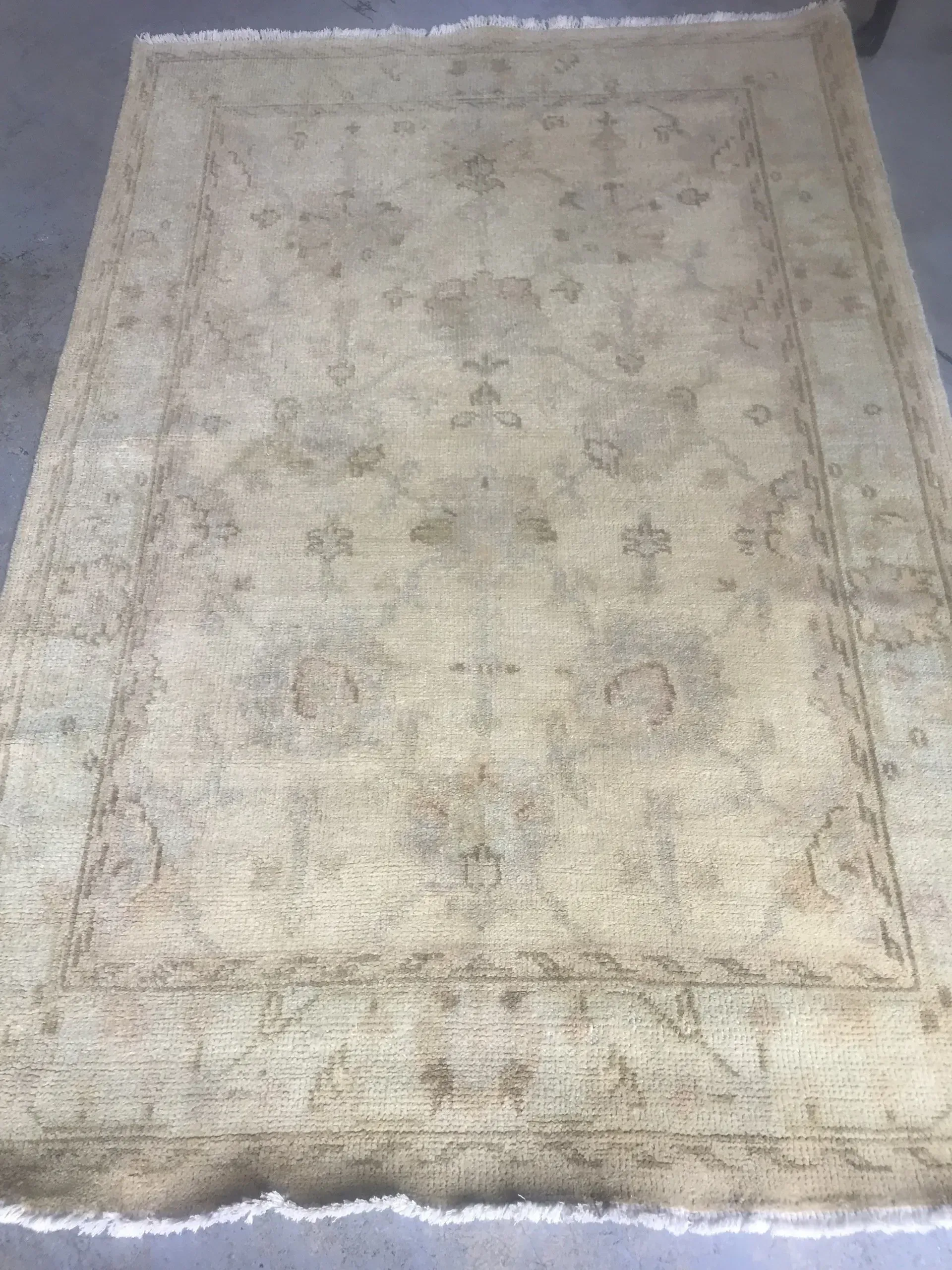 A rug with a detailed pattern on it.