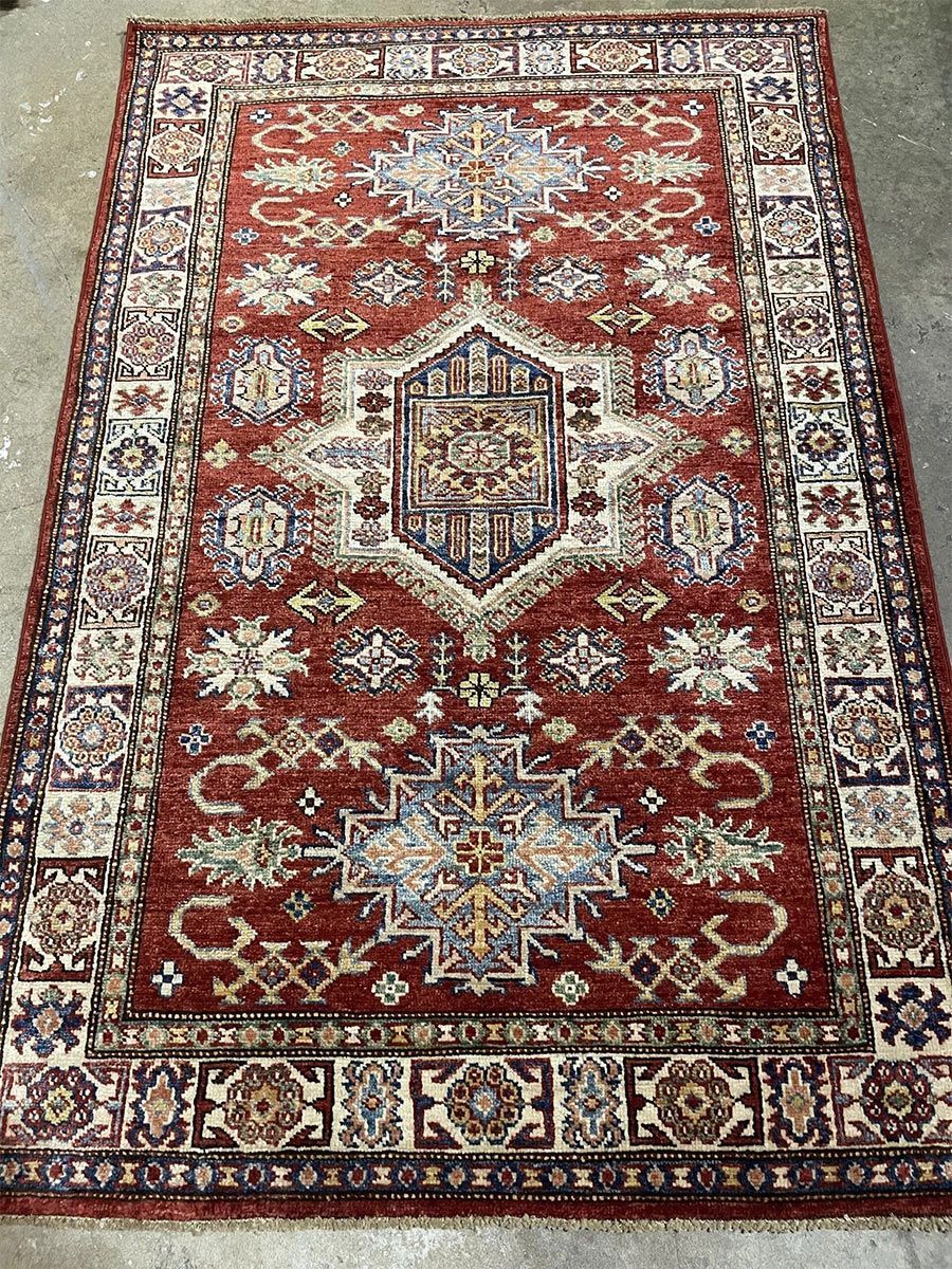 A rug with a detailed pattern on it.