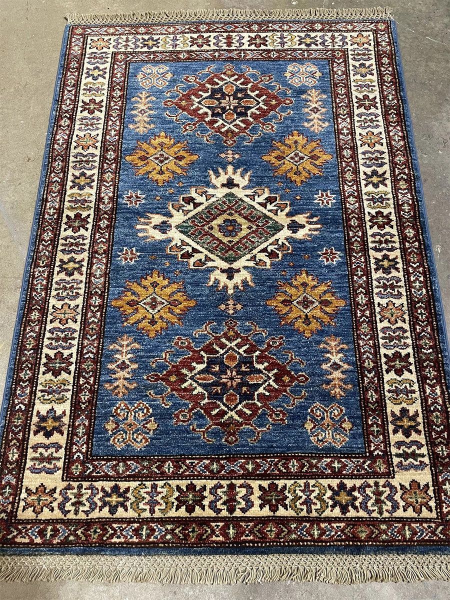A rug with a detailed pattern on it.