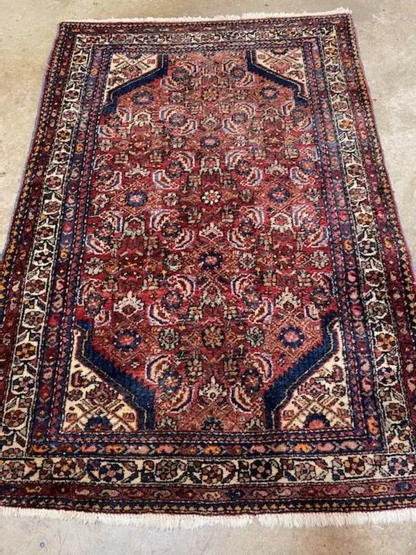 A rug with a detailed pattern on it.