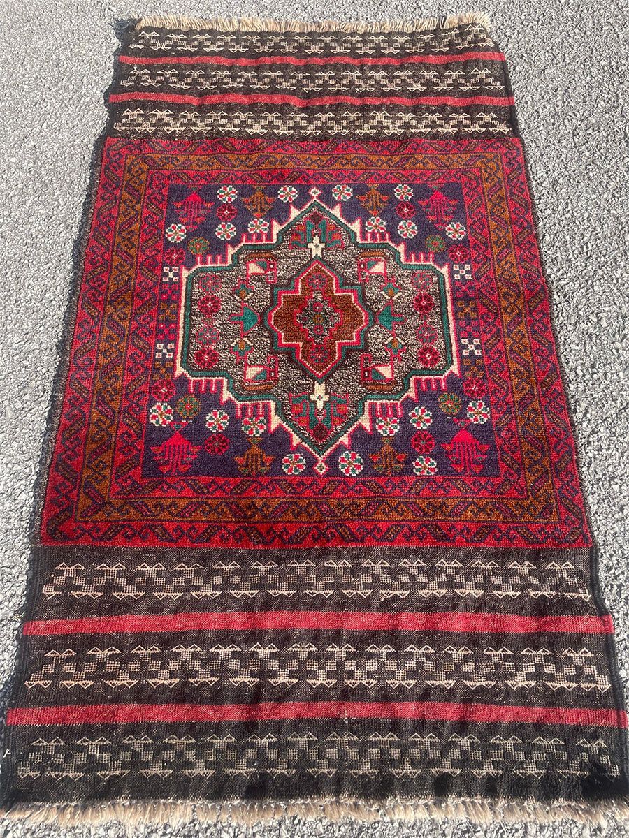 A rug with a detailed pattern on it.