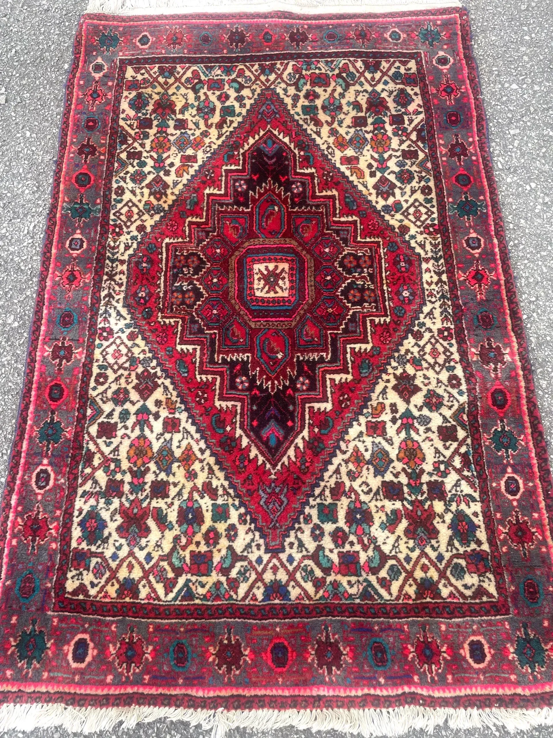 A rug with a detailed pattern on it.