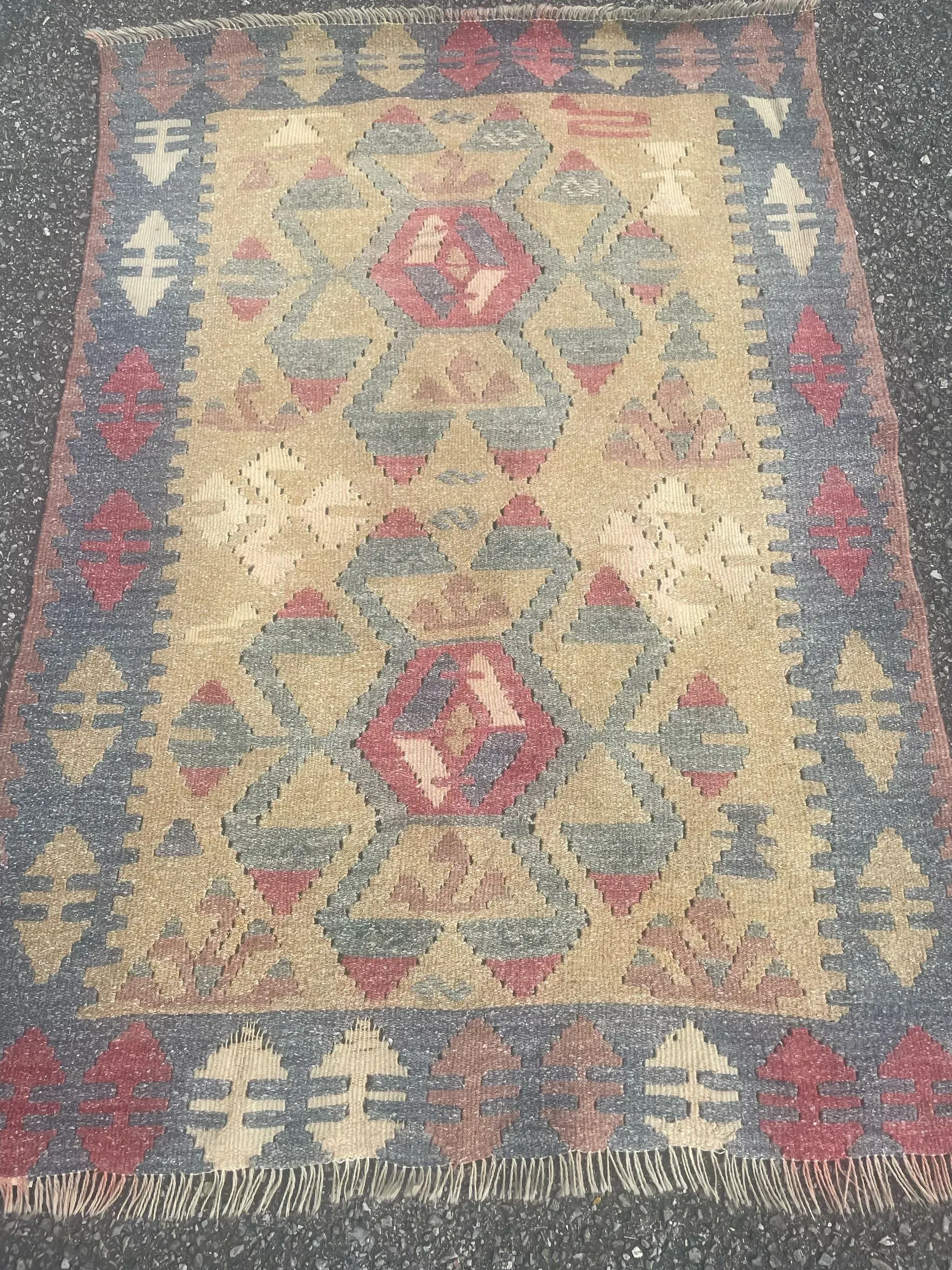 A rug with a detailed pattern on it.