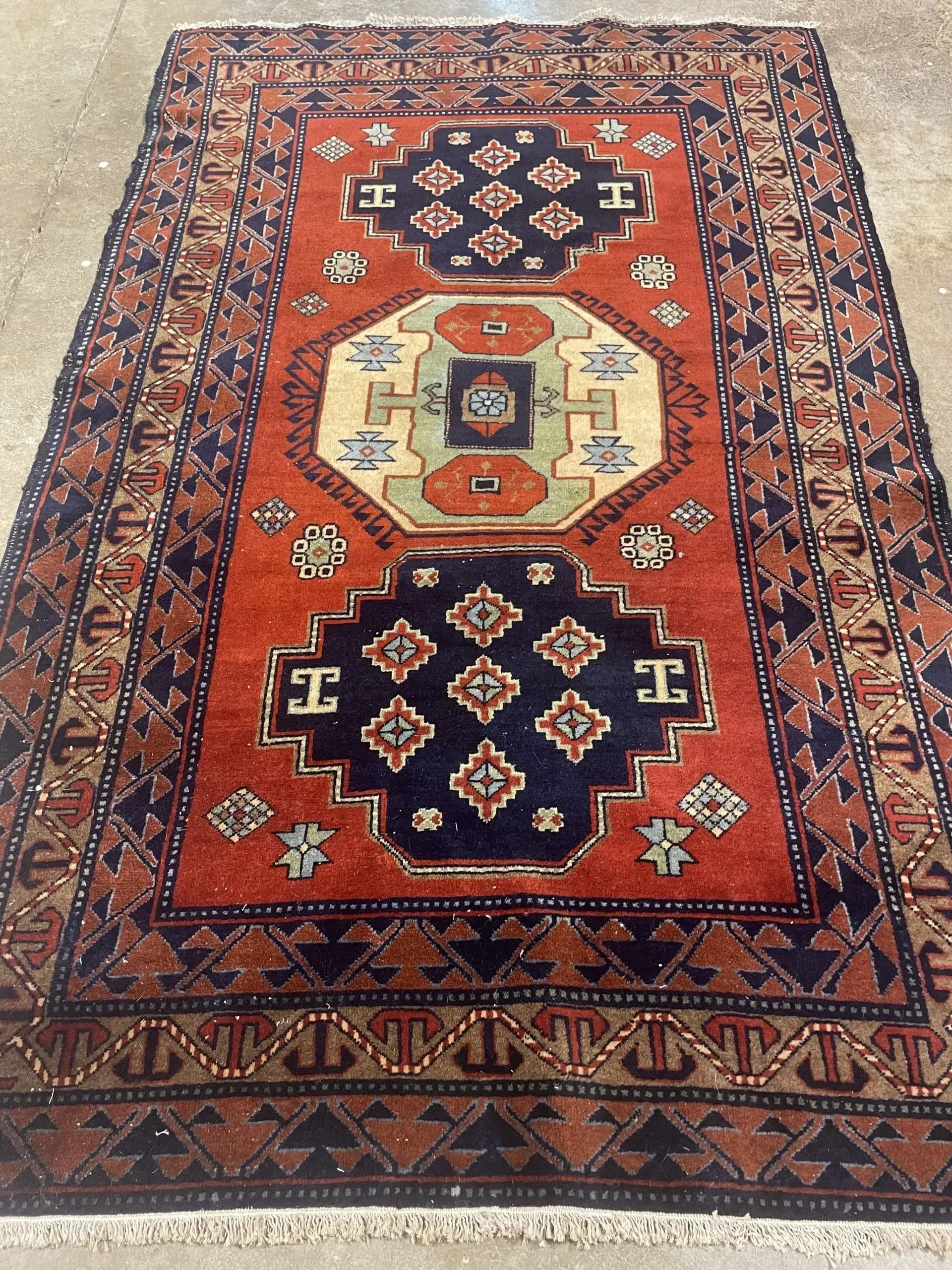 A rug with a detailed pattern on it.
