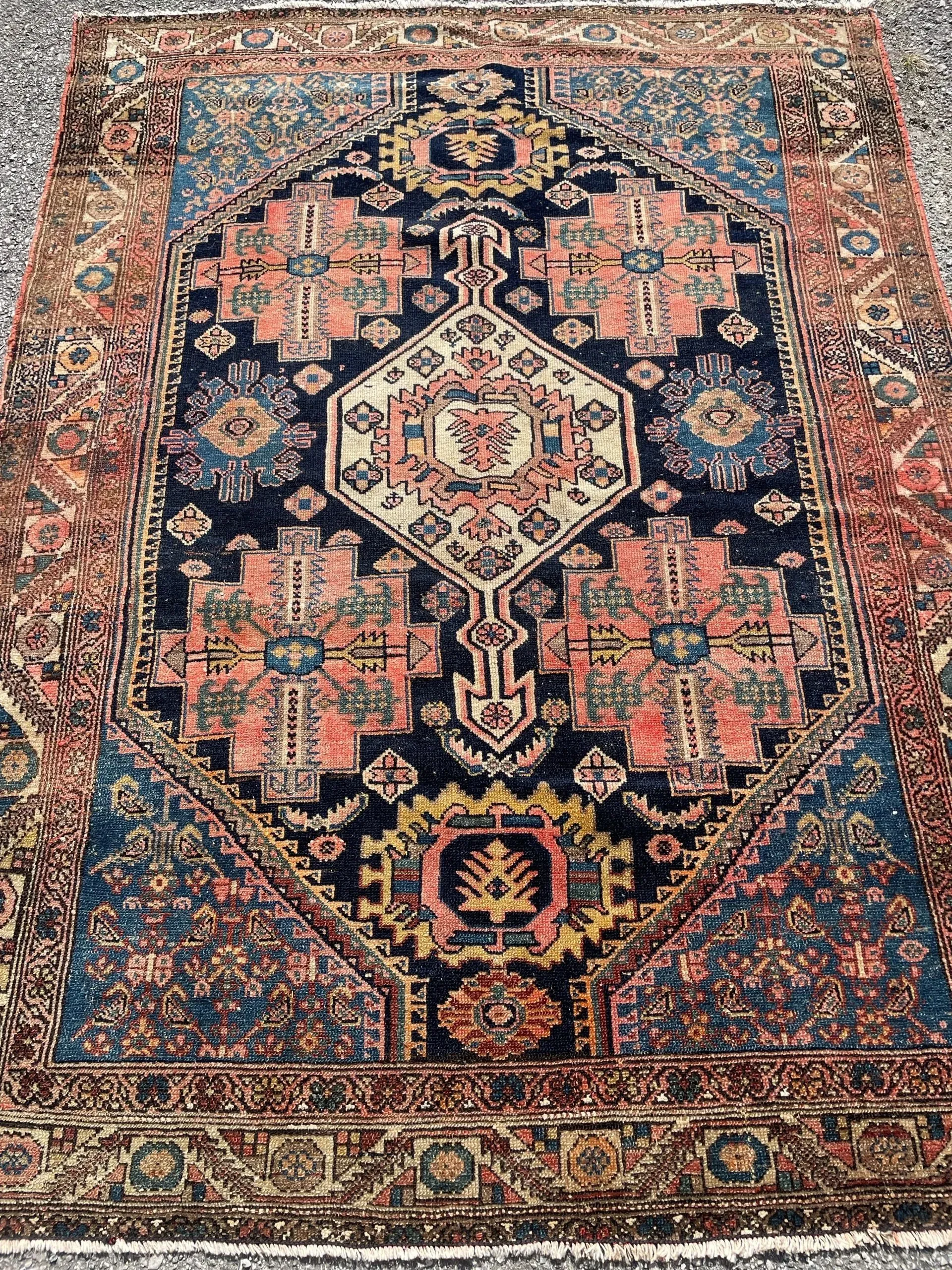A rug with a detailed pattern on it.