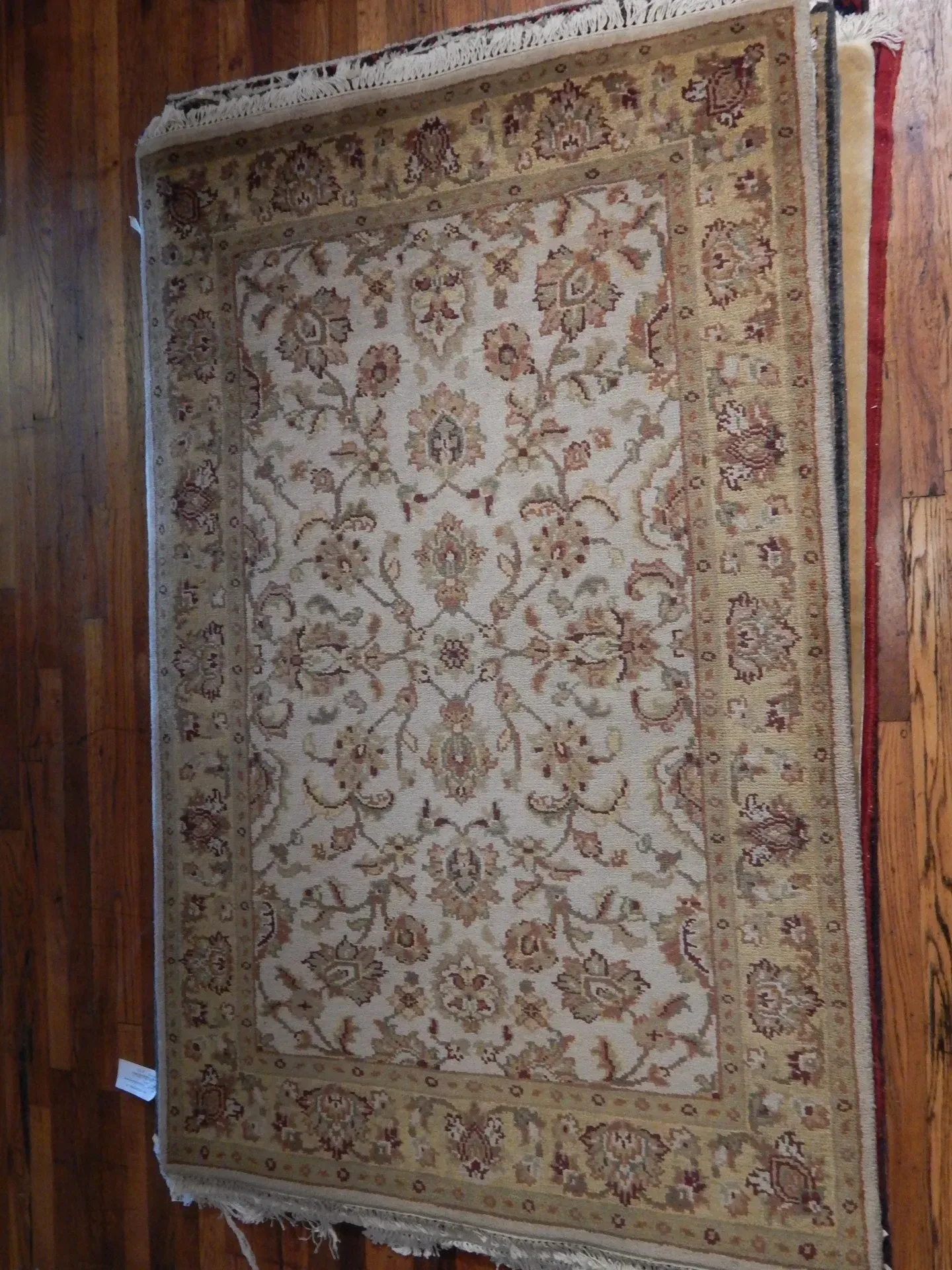 A rug with a detailed pattern on it.