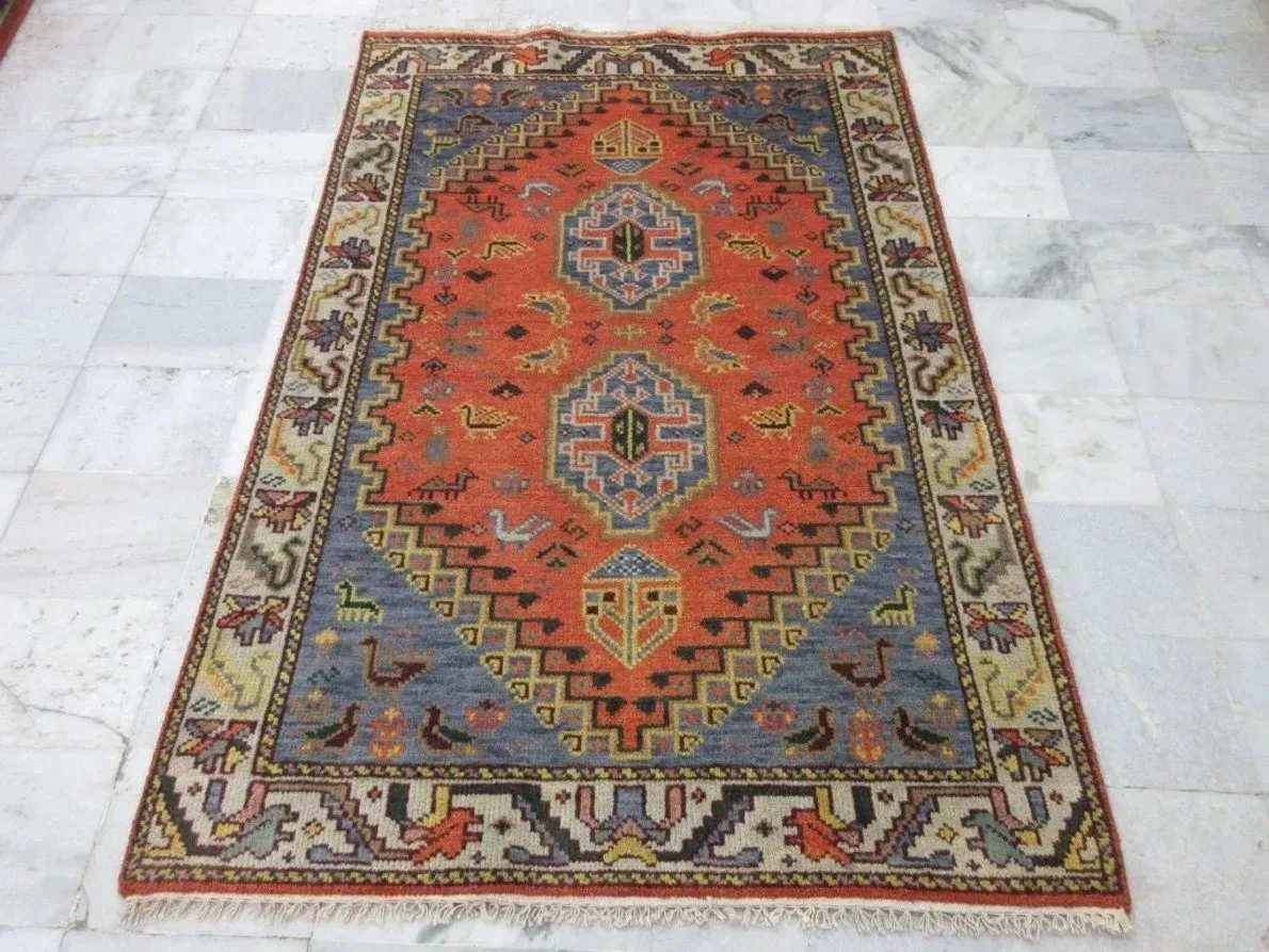 A rug with a detailed pattern on it.