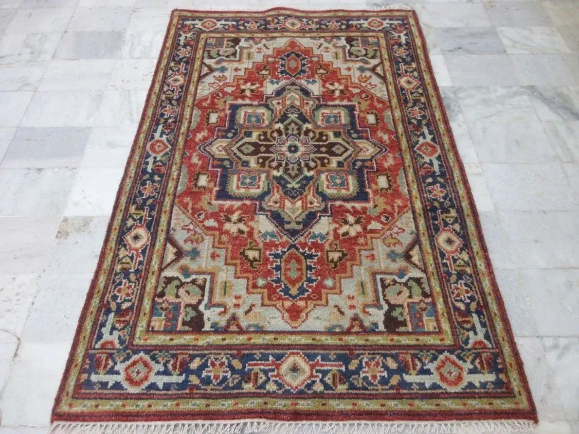A rug with a detailed pattern on it.