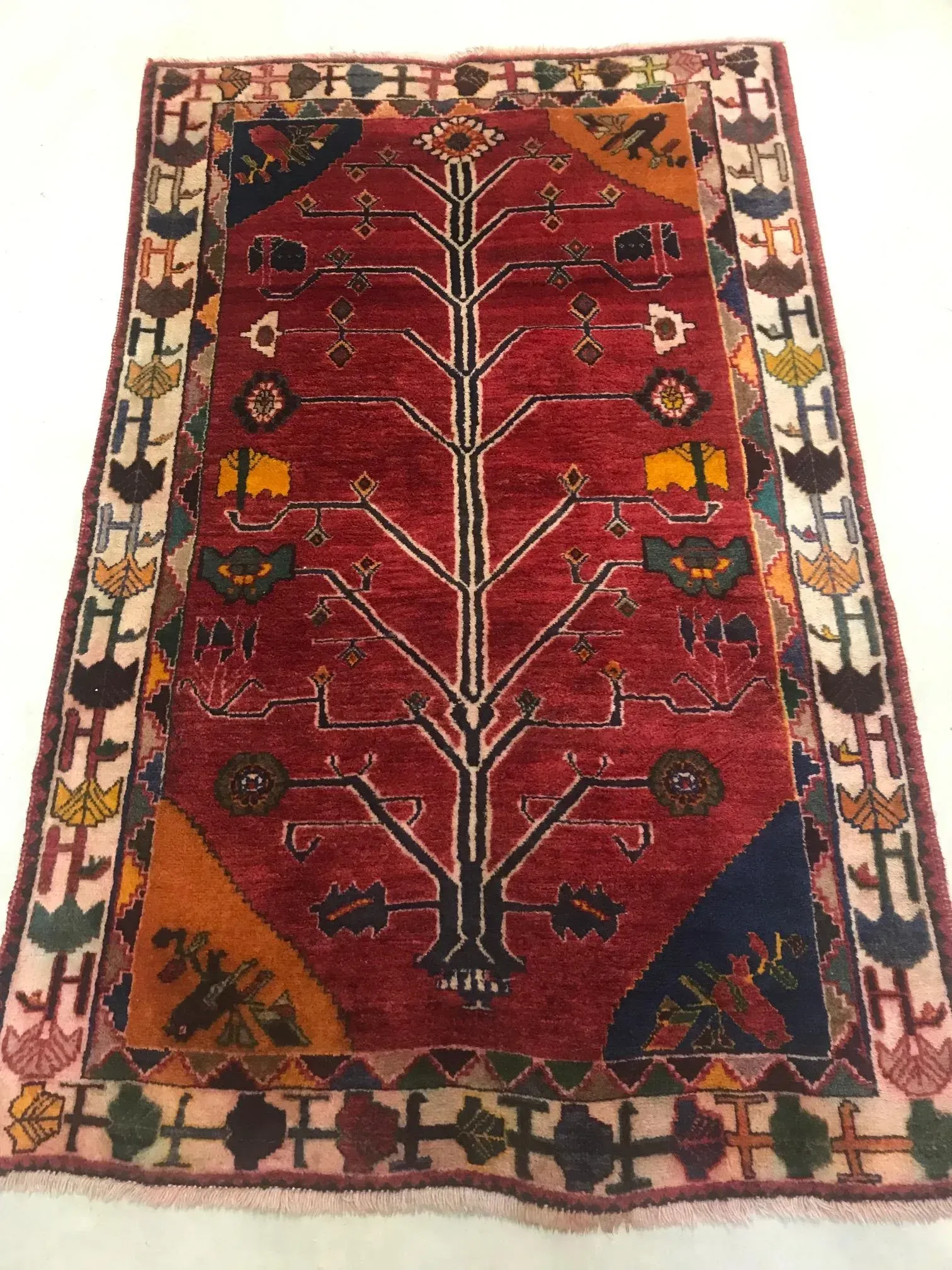A rug with a detailed pattern on it.