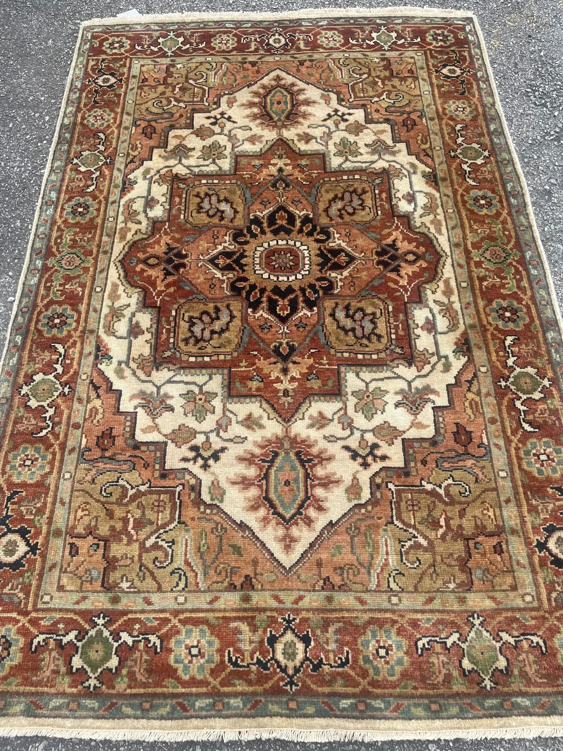 A rug with a detailed pattern on it.