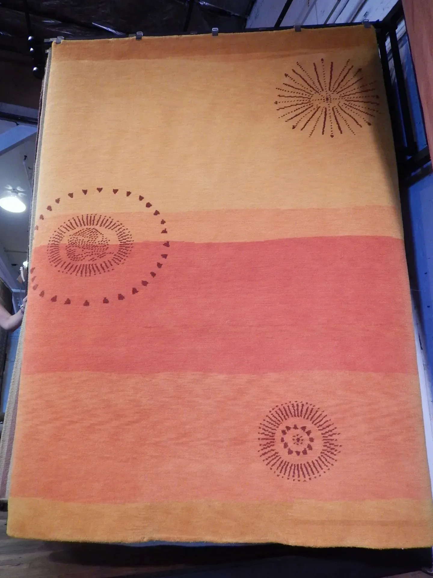 A rug with a detailed pattern on it.