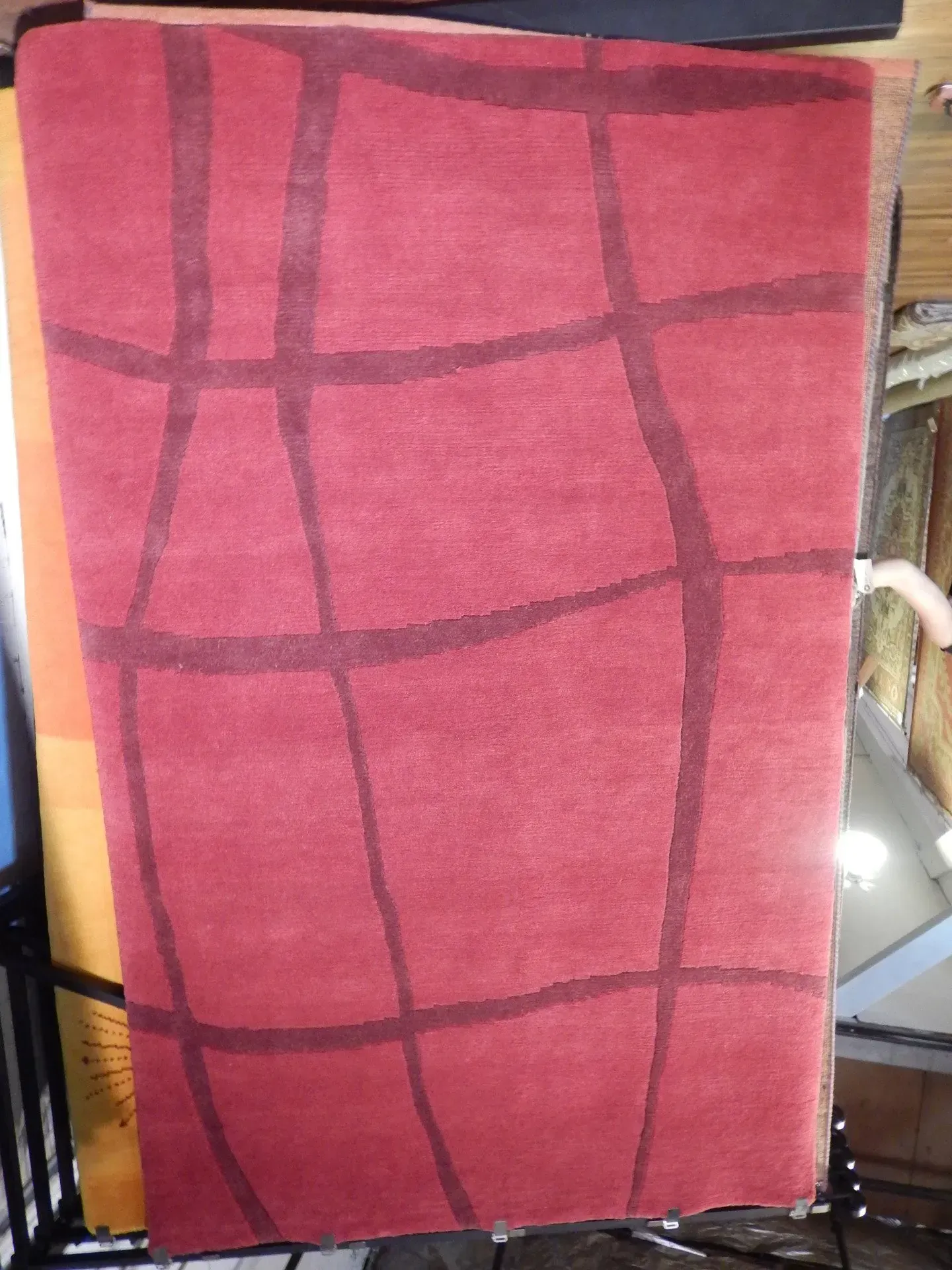 A rug with a detailed pattern on it.