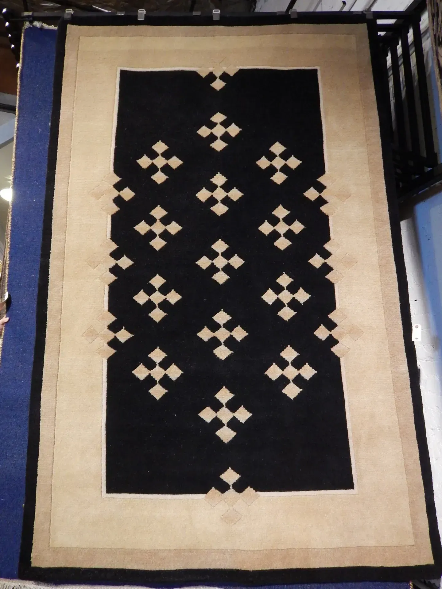 A rug with a detailed pattern on it.