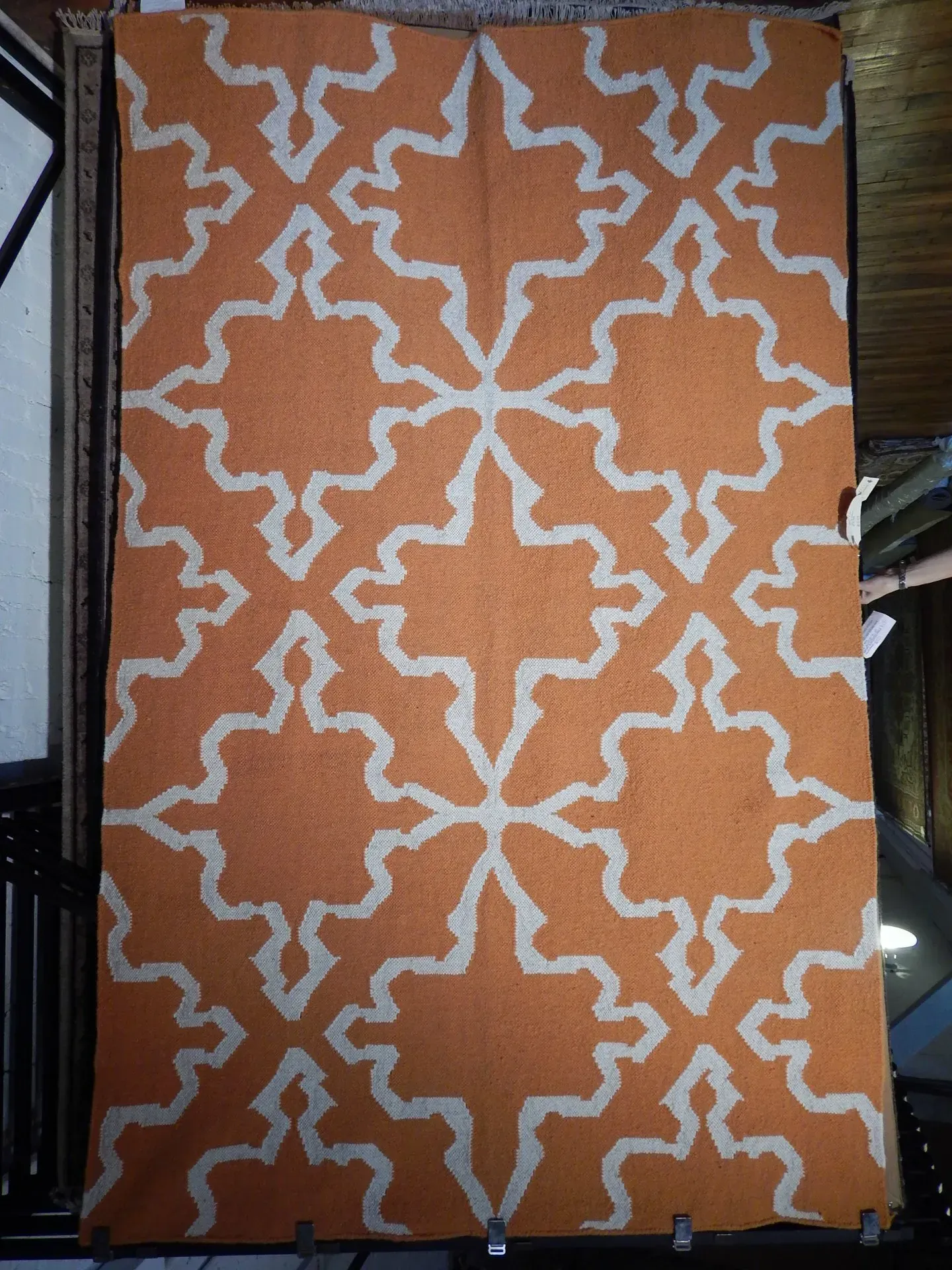 A rug with a detailed pattern on it.