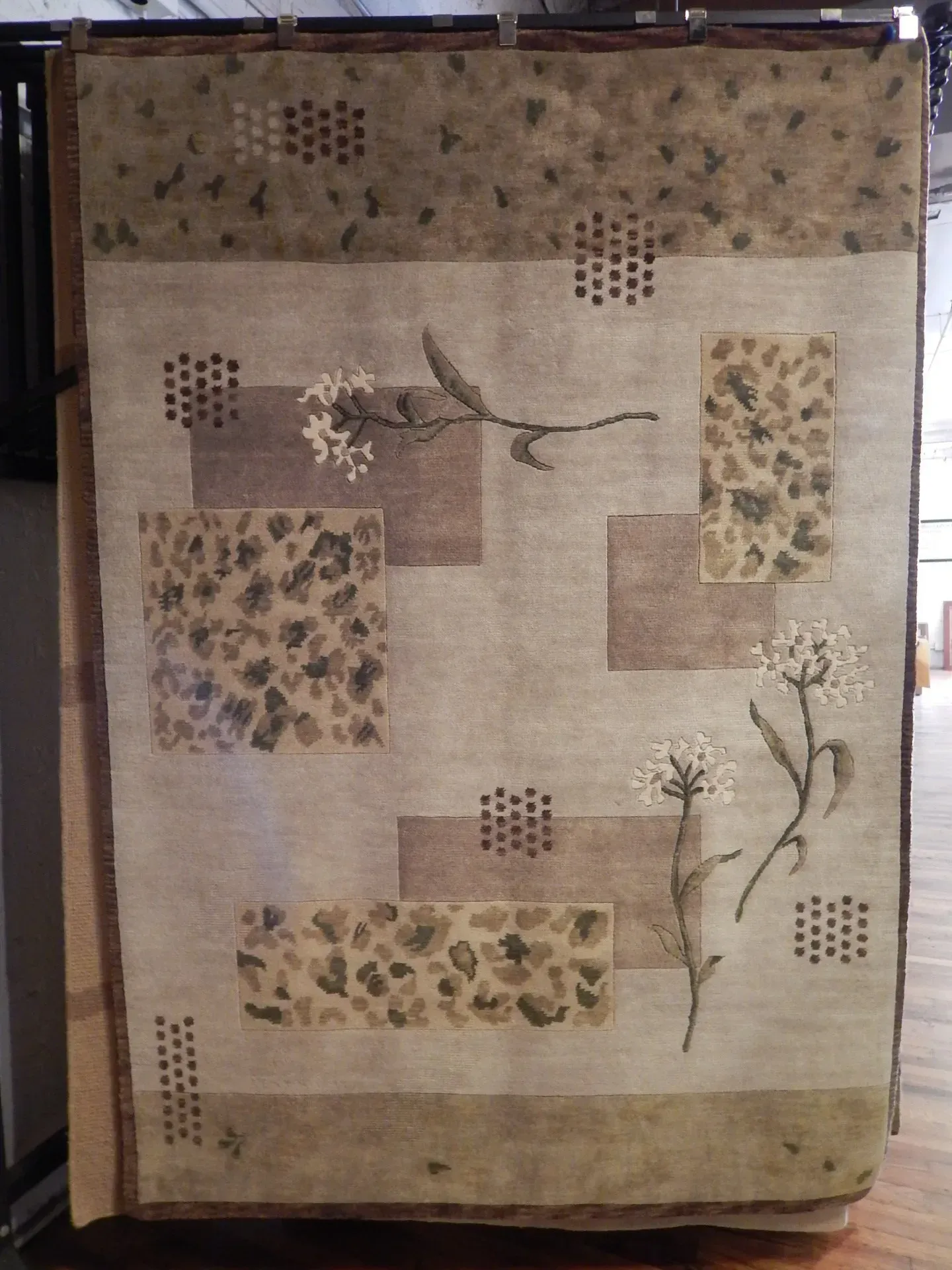 A rug with a detailed pattern on it.