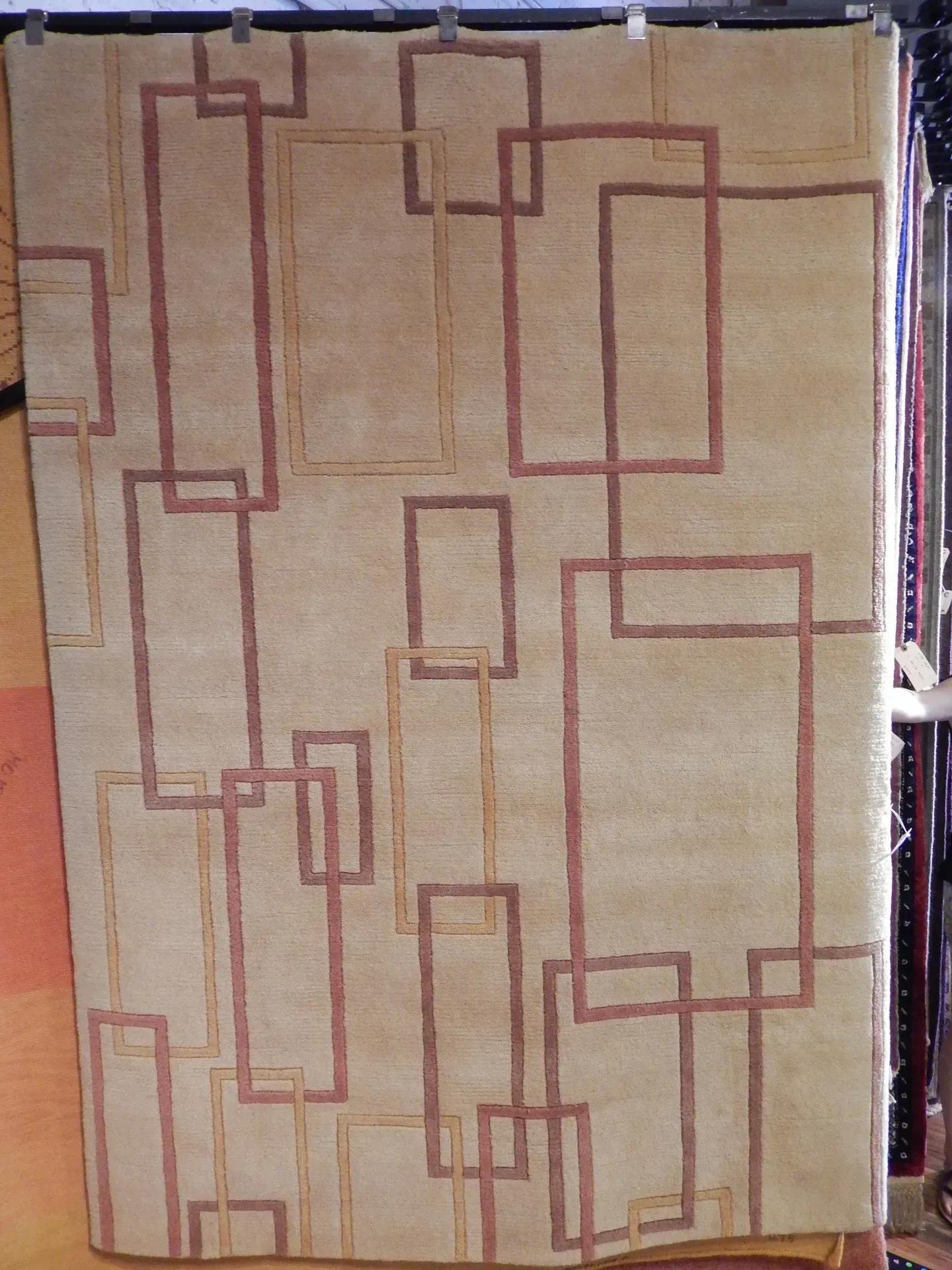 A rug with a detailed pattern on it.