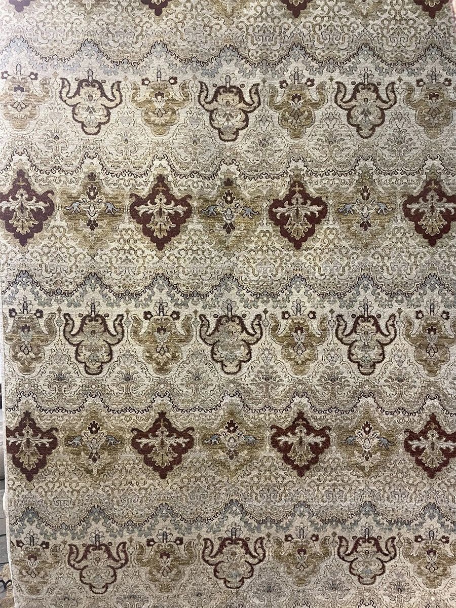 A rug with a detailed pattern on it.