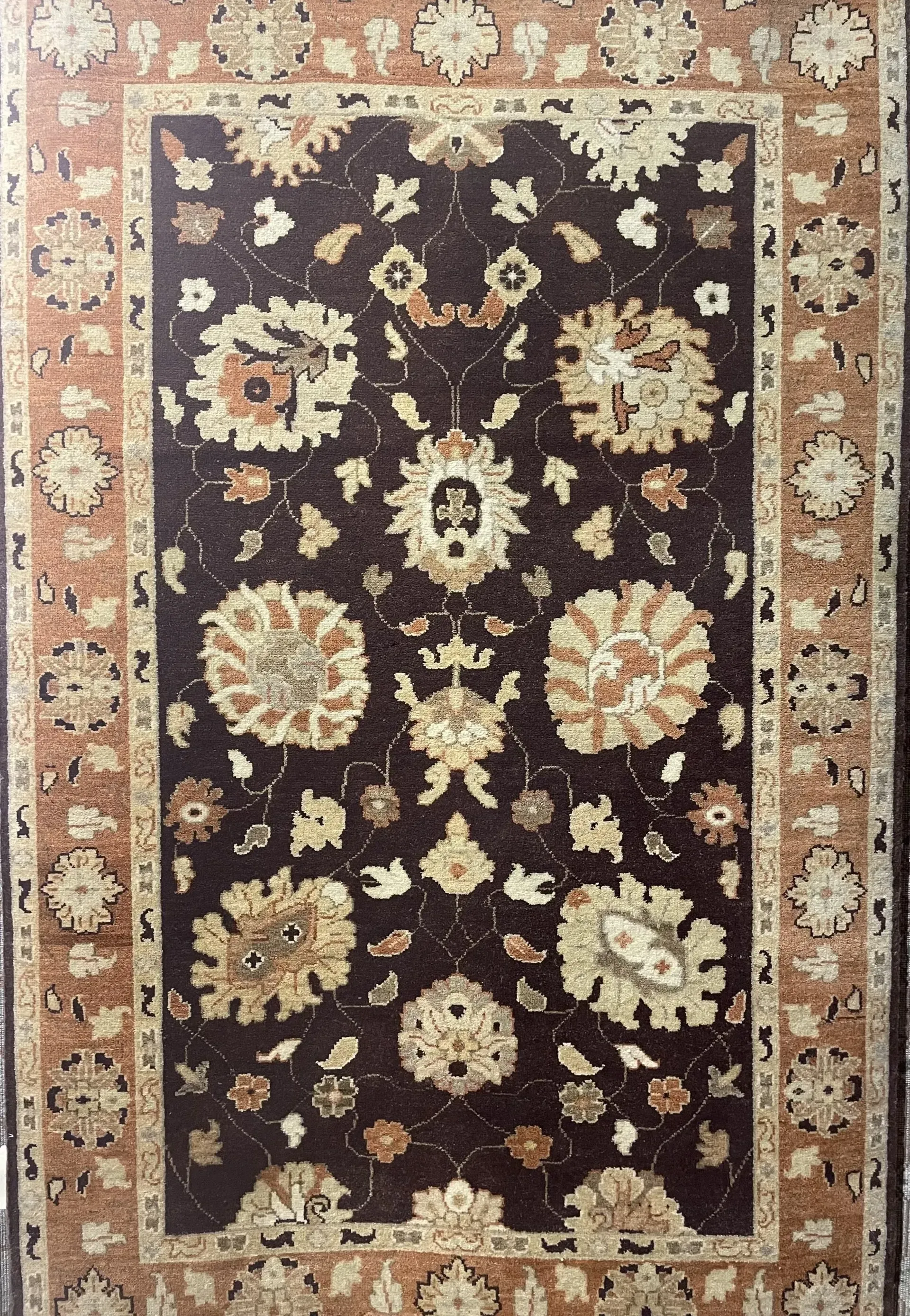 A rug with a detailed pattern on it.