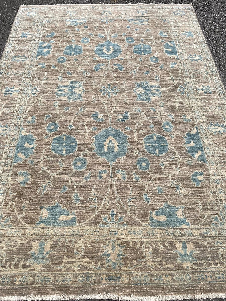 A rug with a detailed pattern on it.