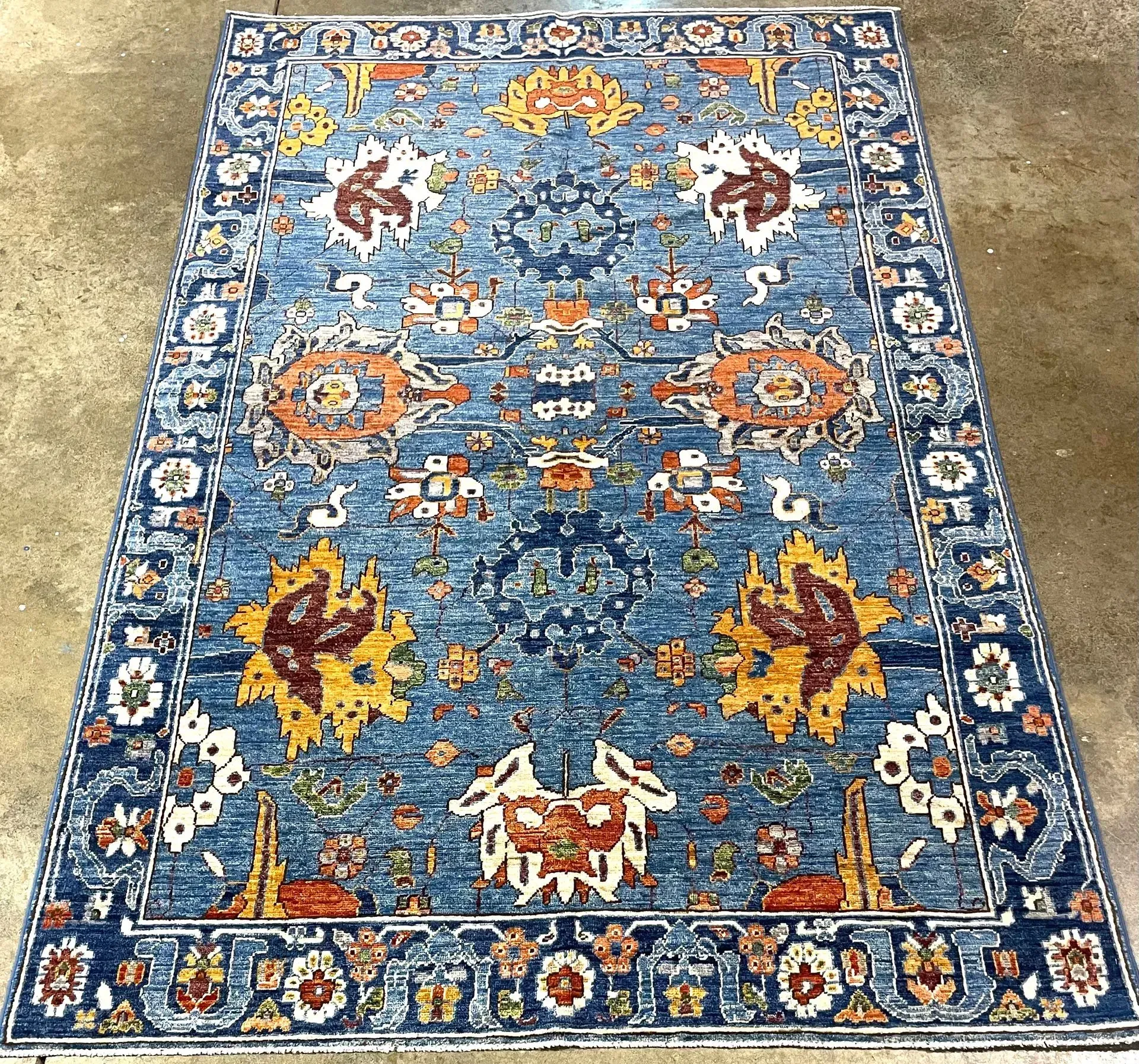 A rug with a detailed pattern on it.