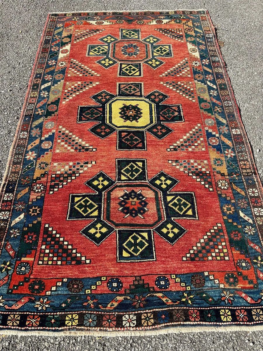 A rug with a detailed pattern on it.
