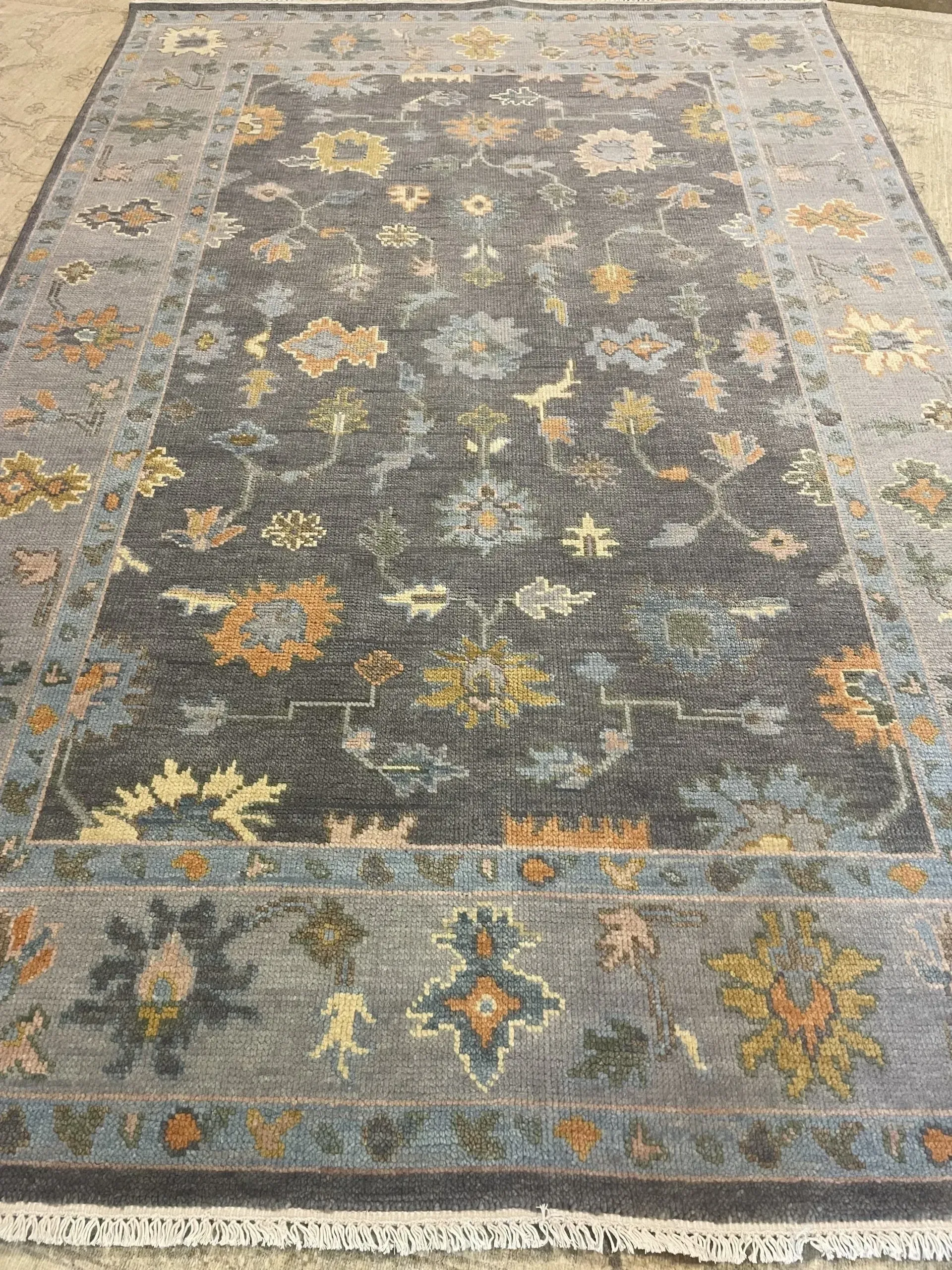 A rug with a detailed pattern on it.