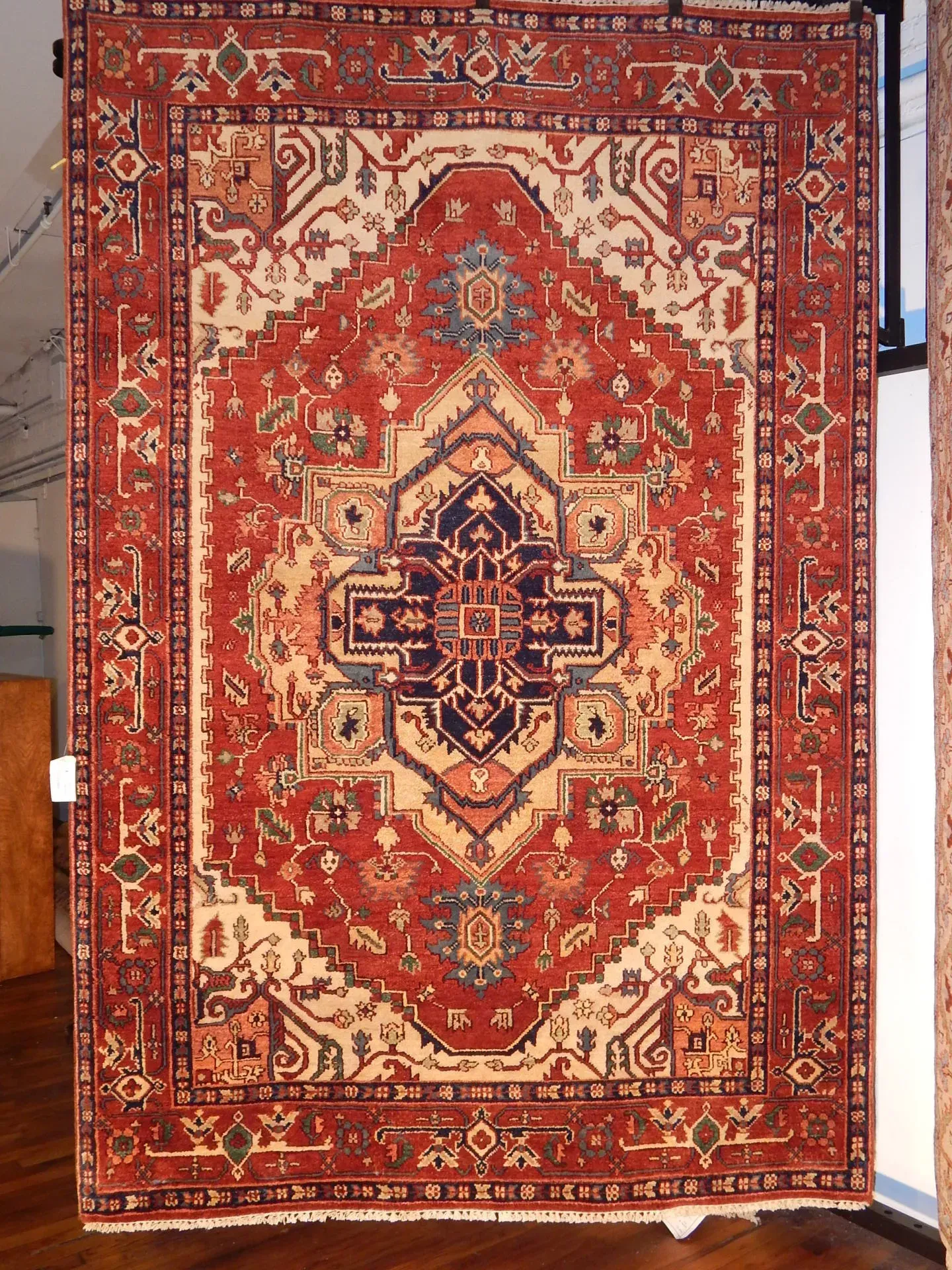 A rug with a detailed pattern on it.