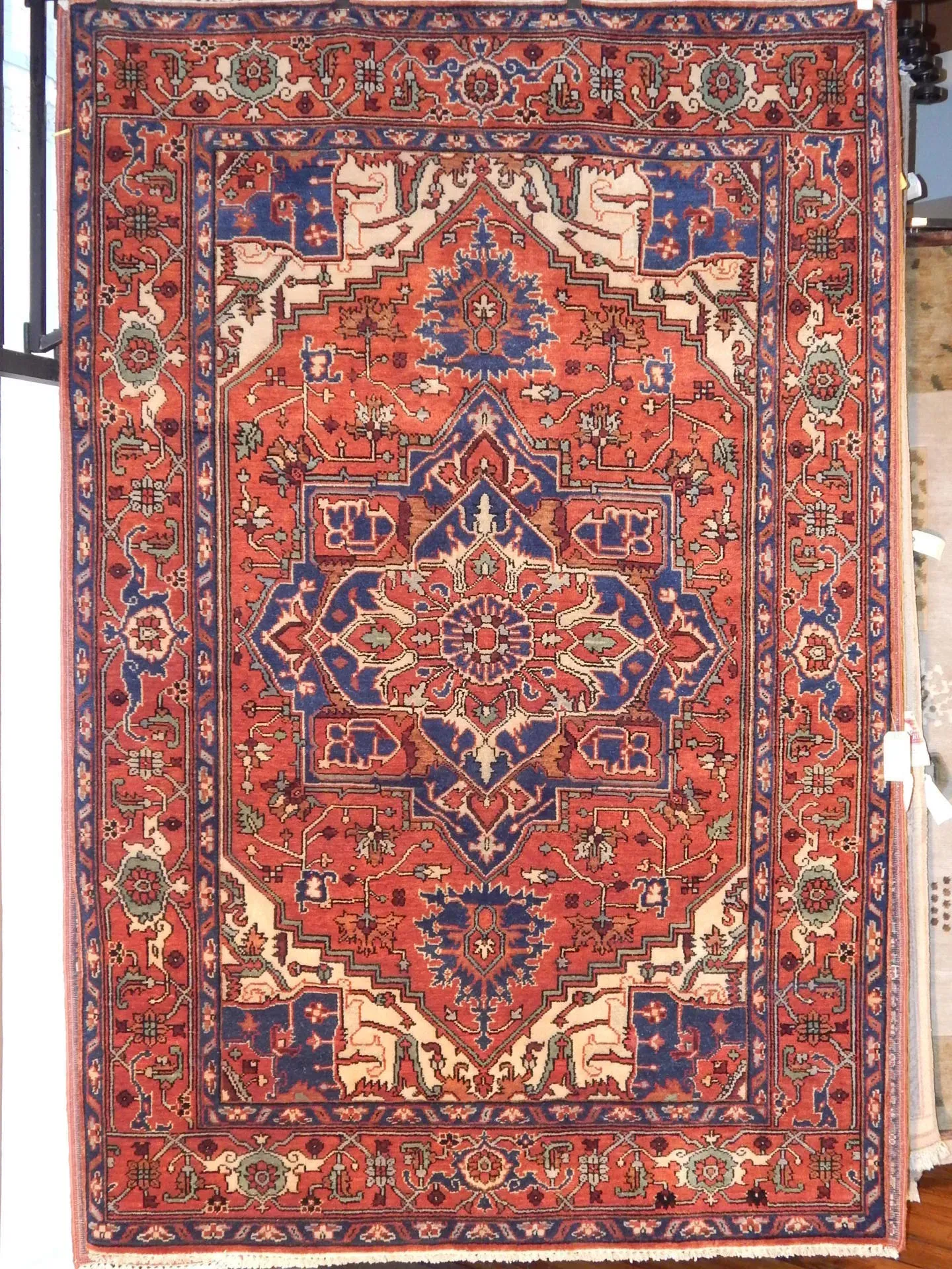 A rug with a detailed pattern on it.