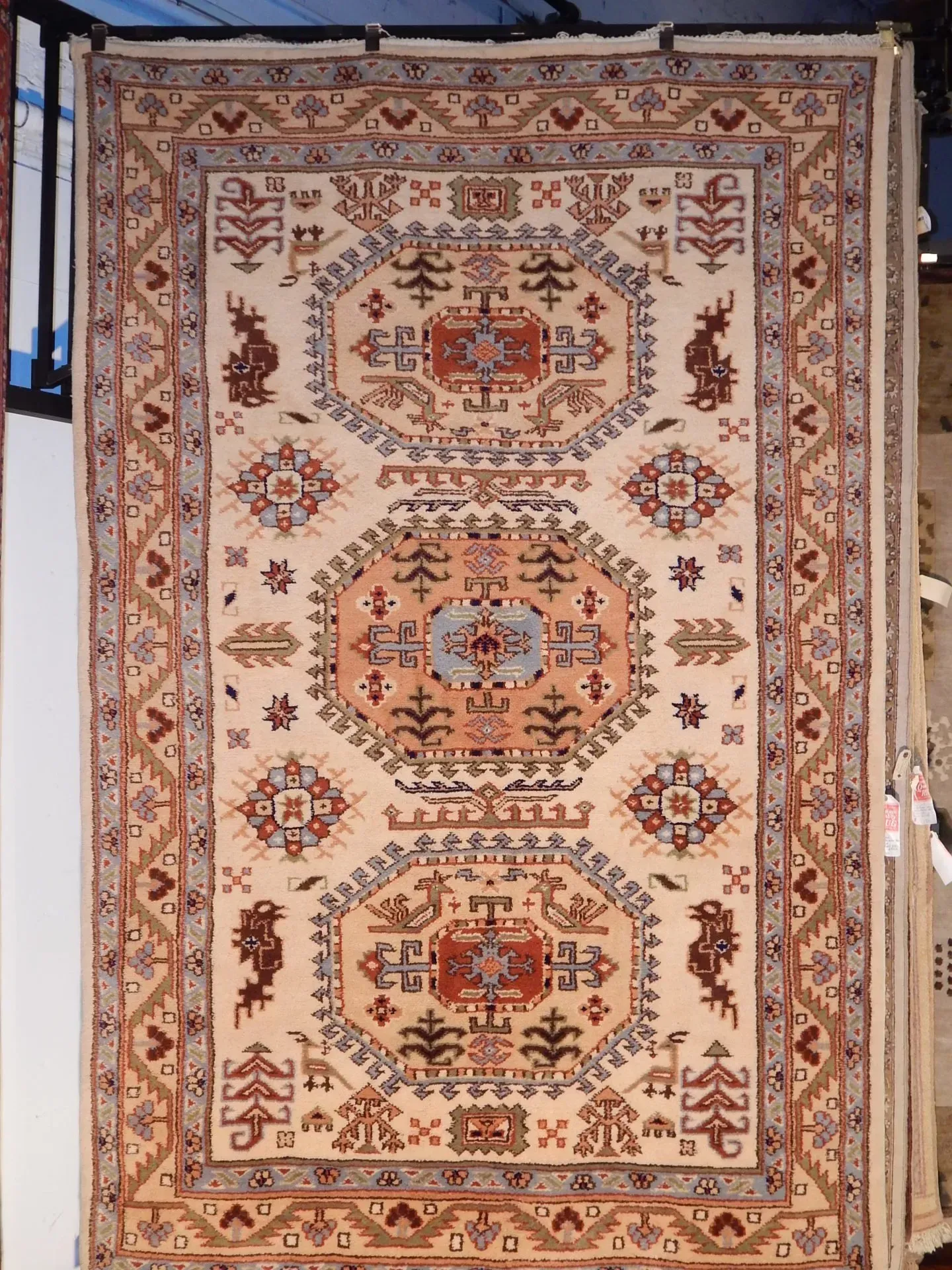 A rug with a detailed pattern on it.