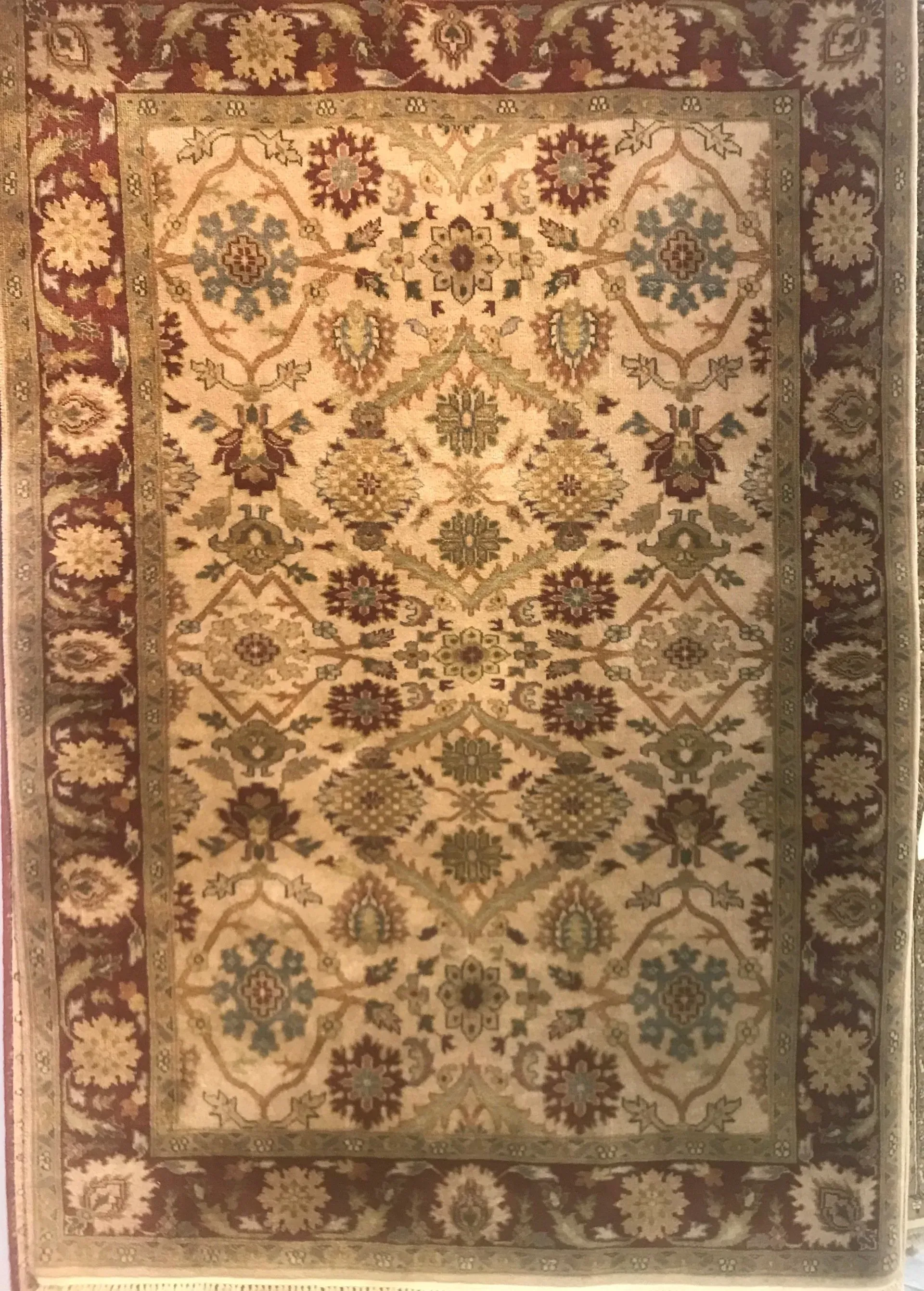 A rug with a detailed pattern on it.