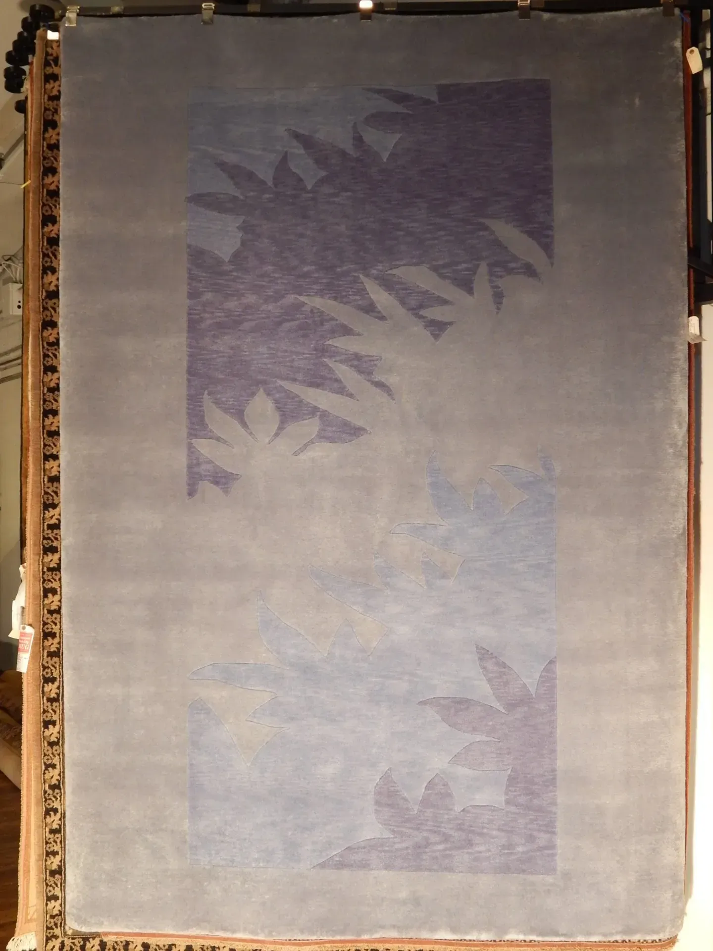 A rug with a detailed pattern on it.