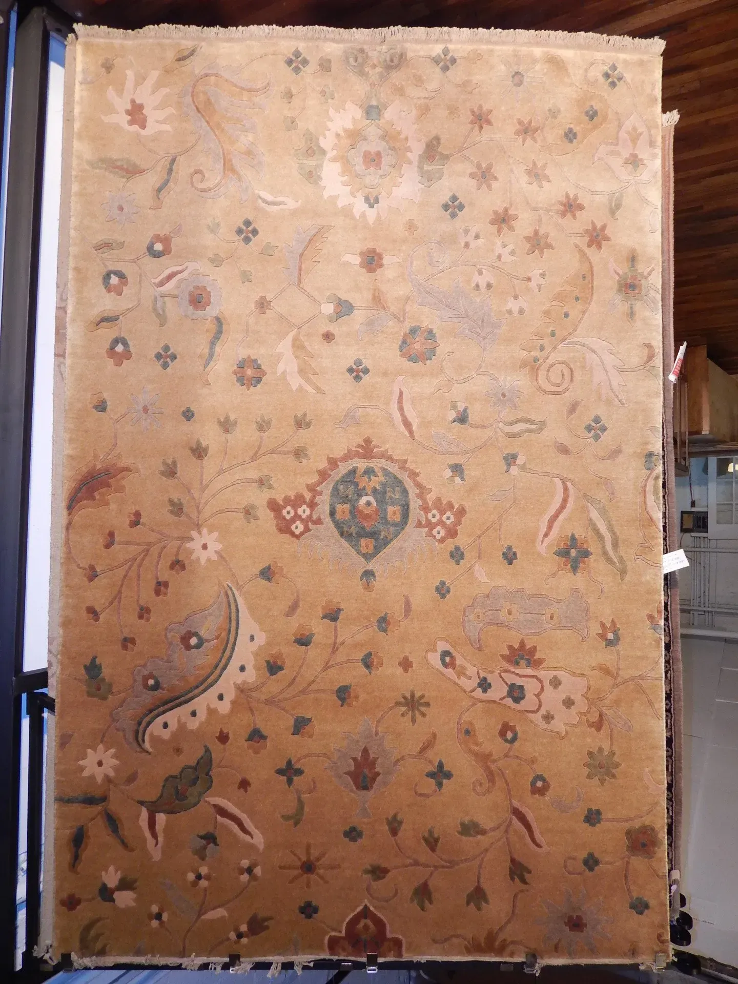 A rug with a detailed pattern on it.