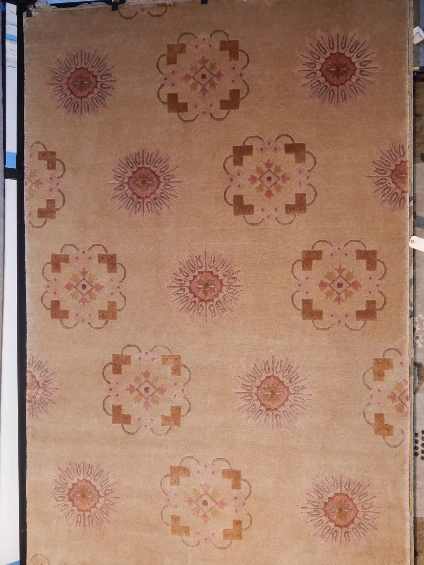 A rug with a detailed pattern on it.