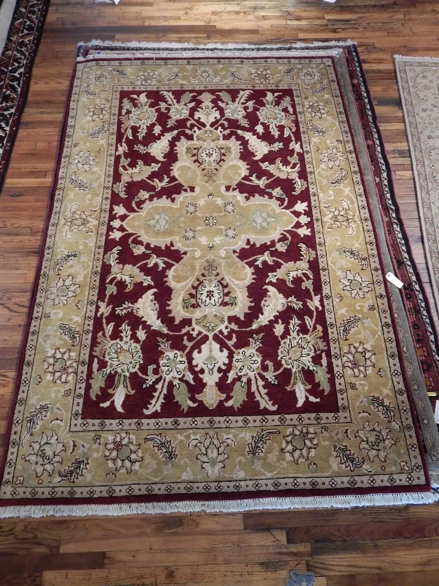 A rug with a detailed pattern on it.